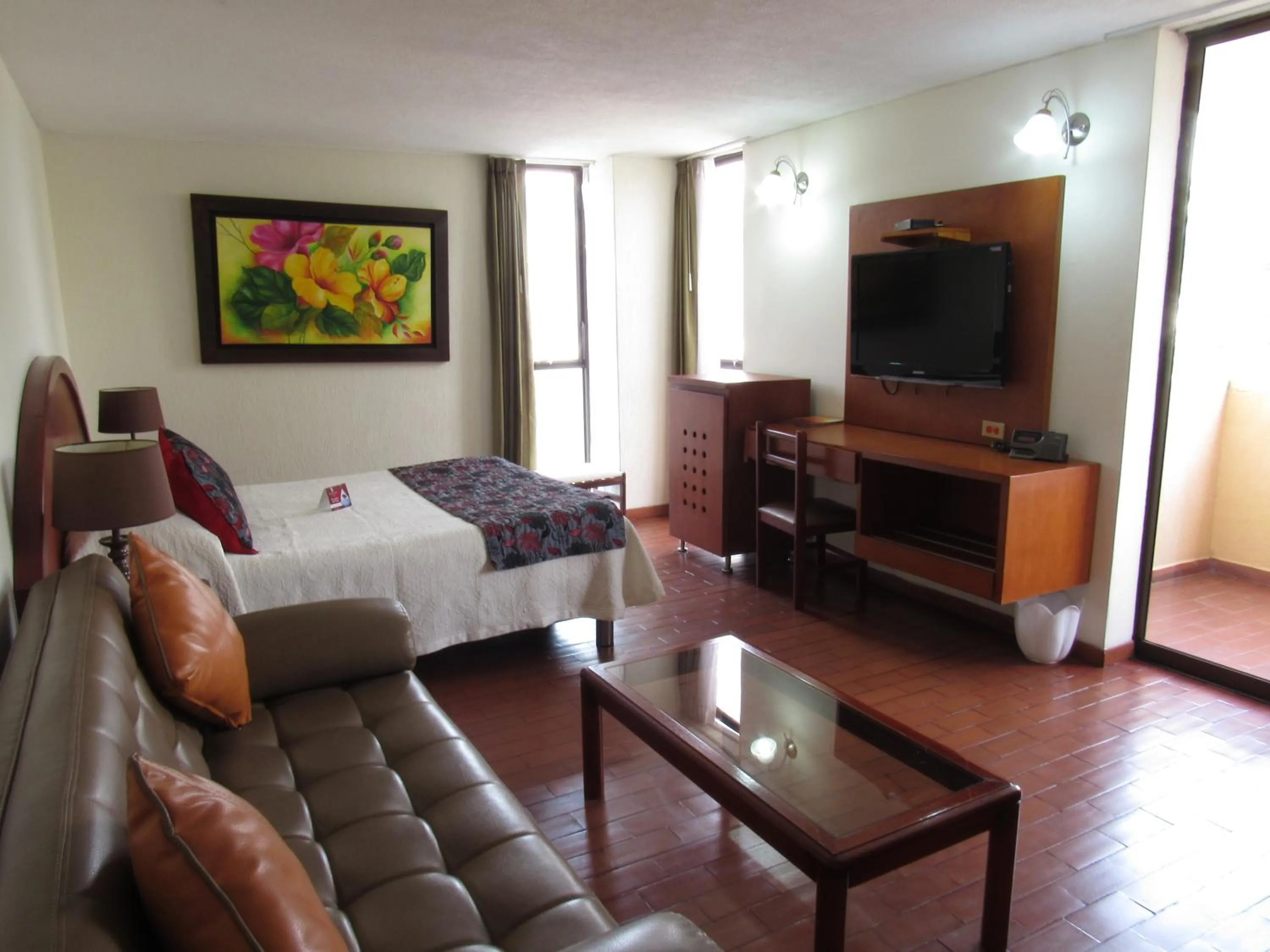 Living room, Bed in Hotel Don Lolo