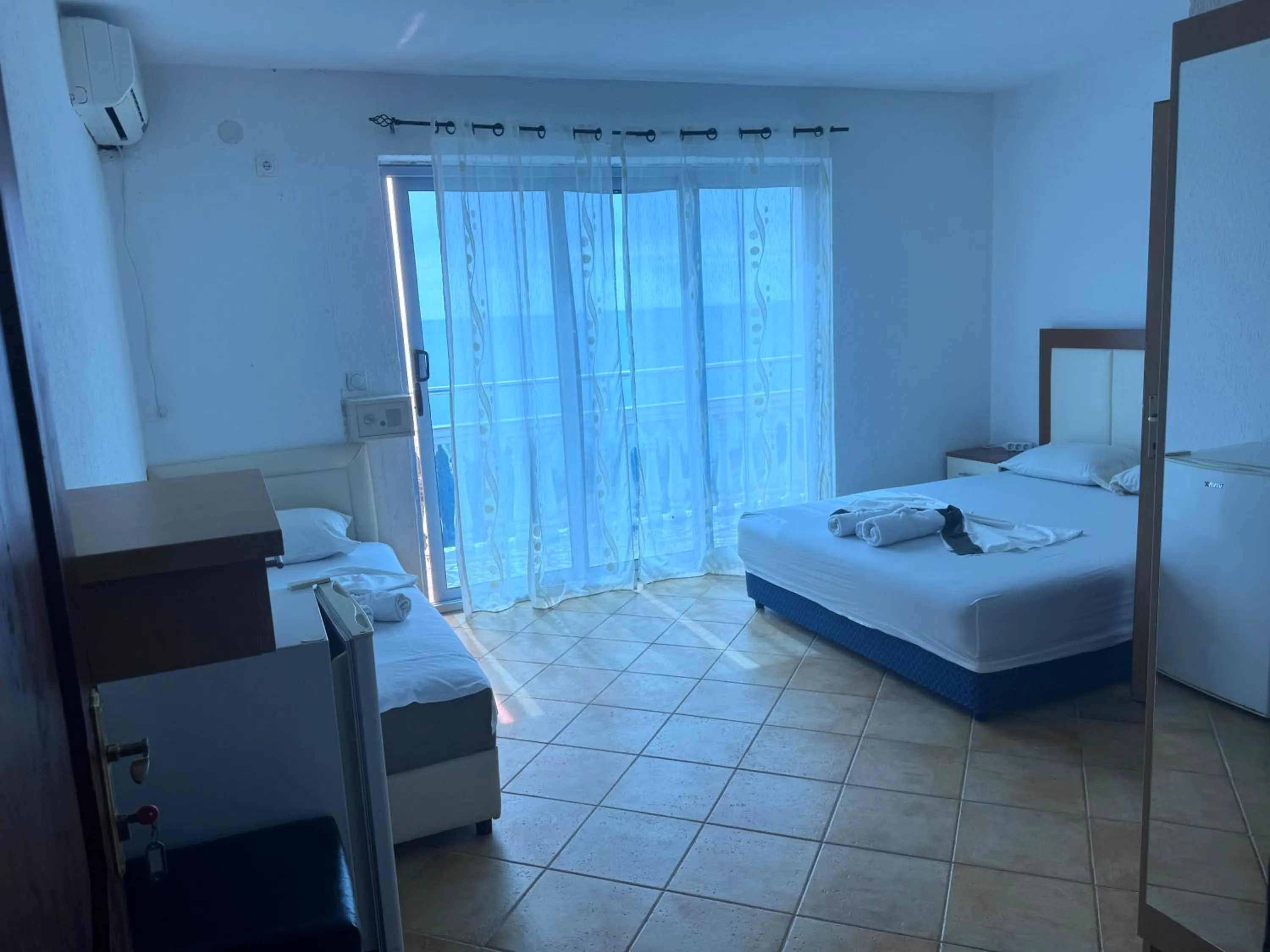 Standard Triple Room with Sea View in Apartments Monte