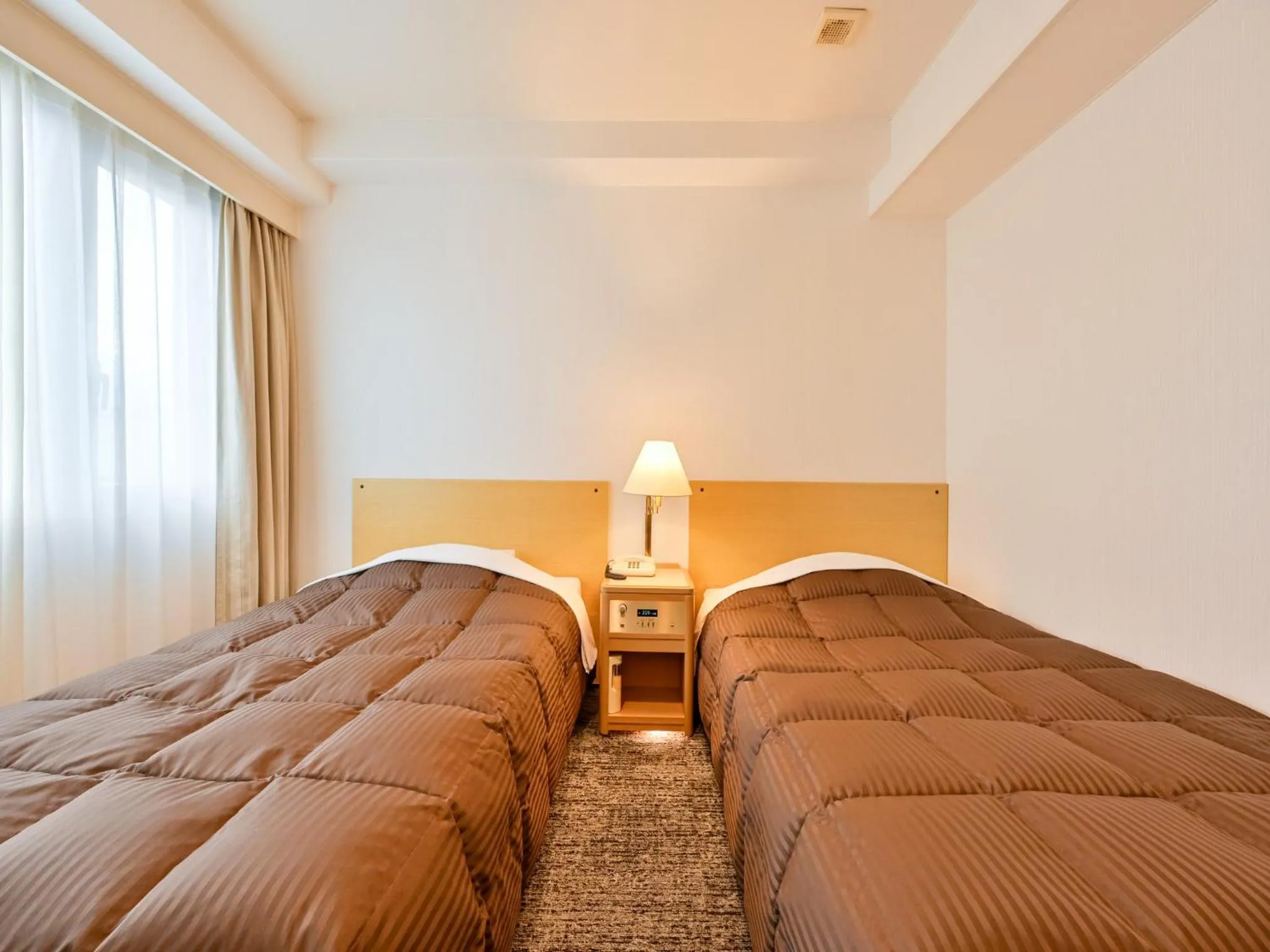 Bed in Hotel Sun Valley Annex