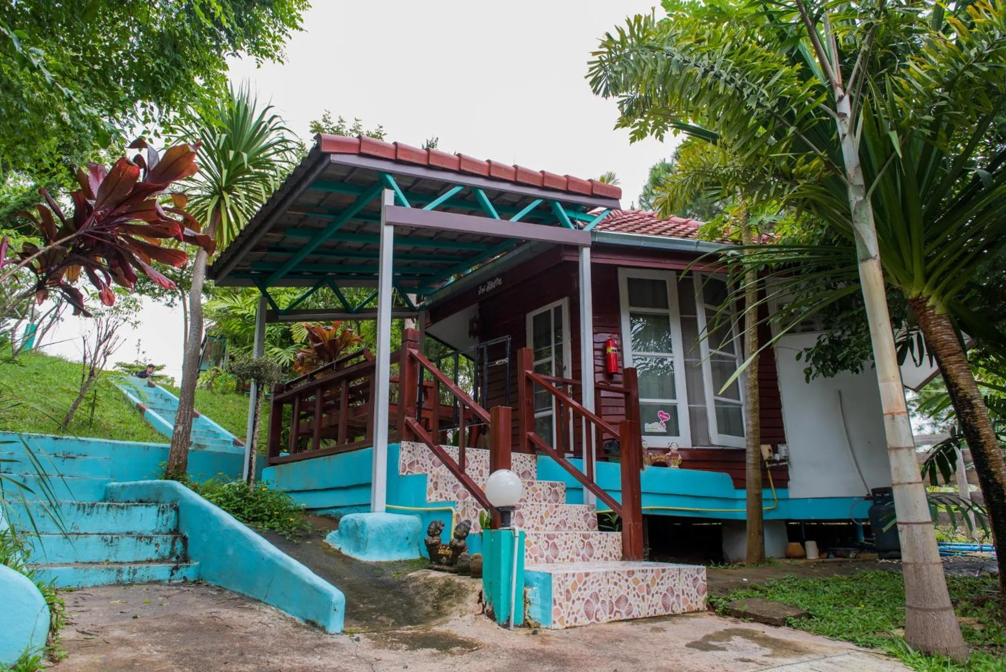 Bedroom in Fufu In Love Cottages & Campground