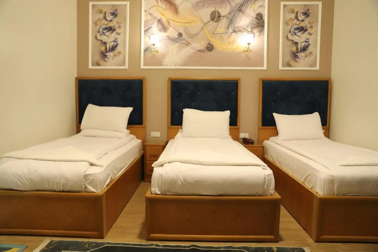 Bed in Golden Palace Hotel