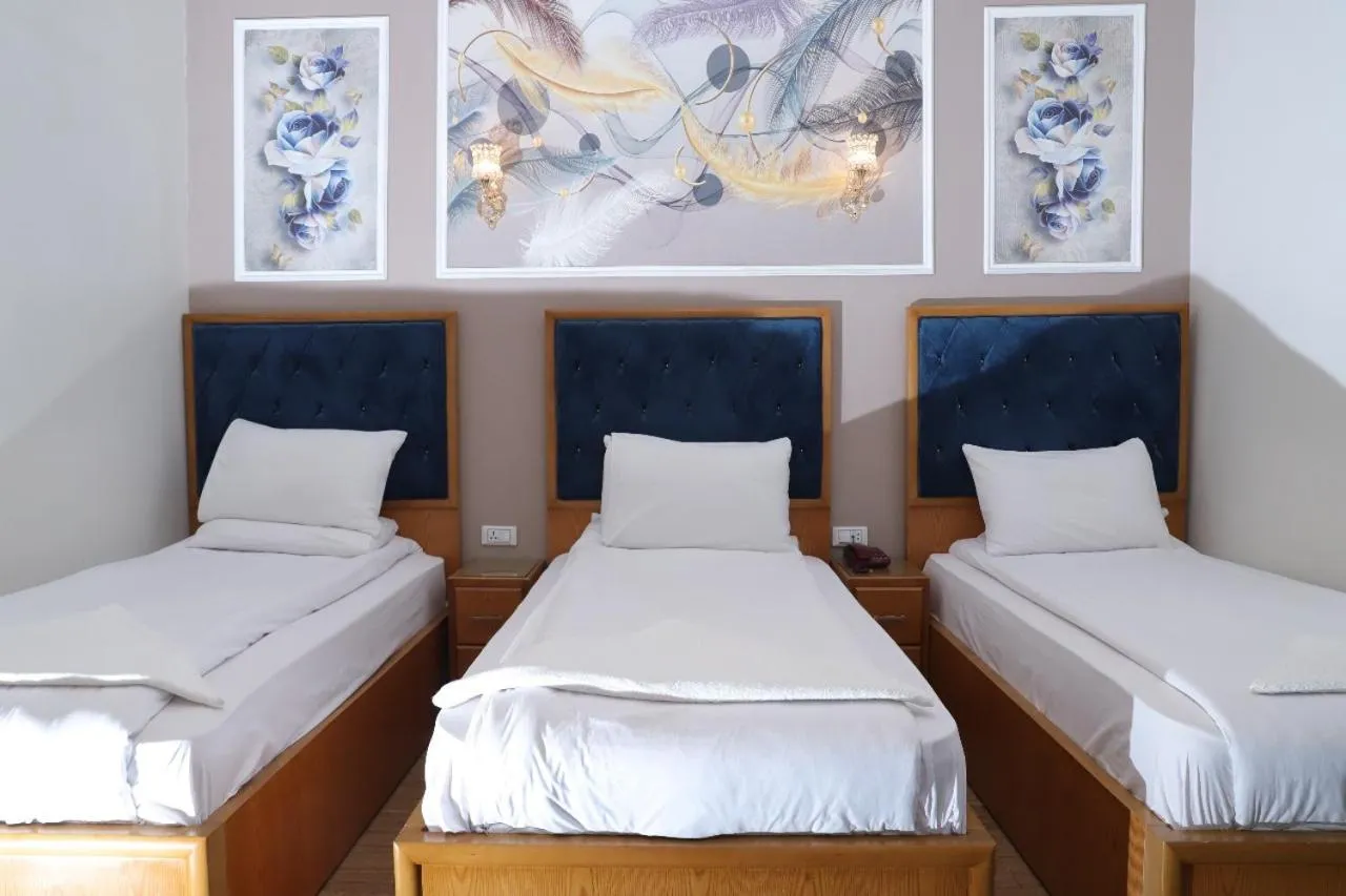 Bed in Golden Palace Hotel