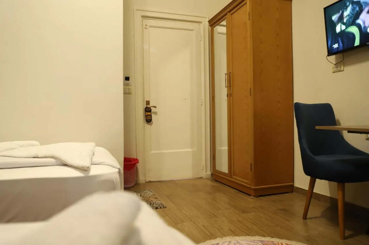 Bed in Golden Palace Hotel