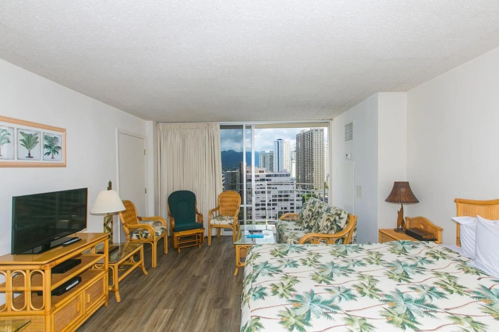 Bed in Ilikai Marina Studio City View Condos with Fully Equipped Kitchens & Free Wifi