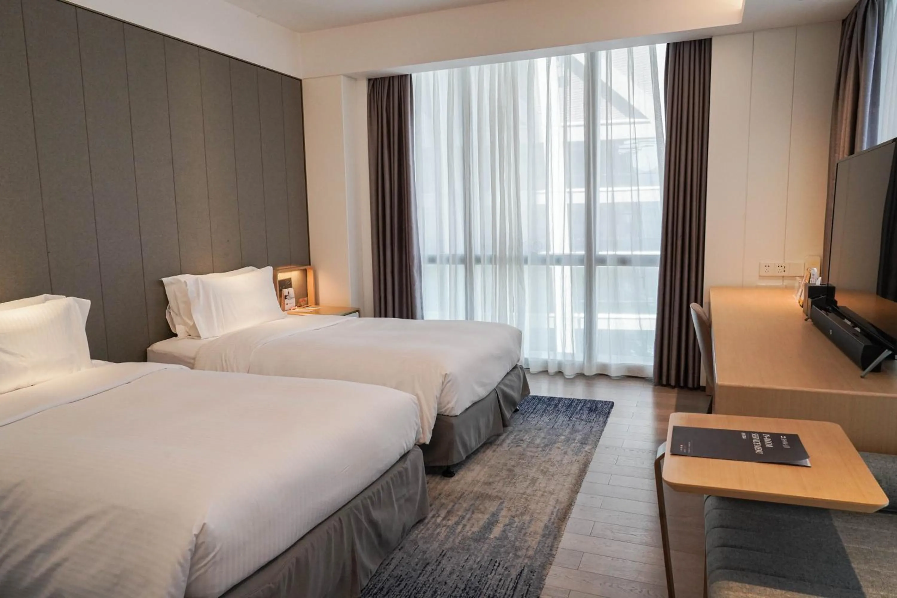 Bed in Ascott Raffles City Chongqing
