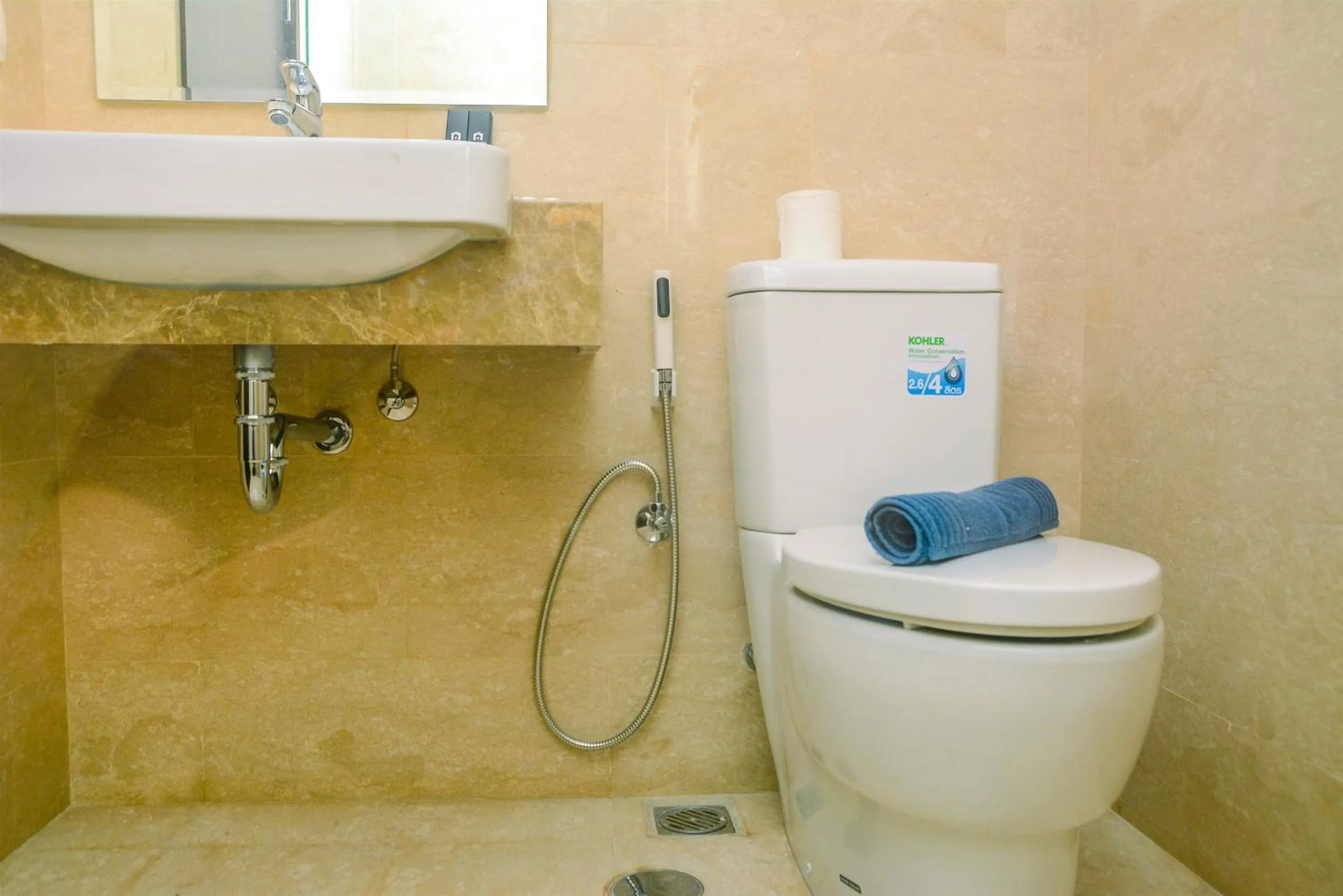 Bathroom in Modern and Cozy Studio Menteng Park Apartment By Travelio