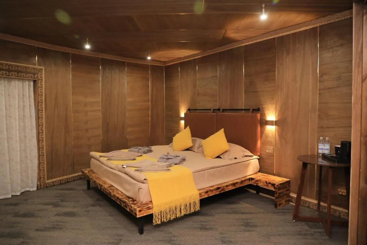 Bed in My hotel Karakol