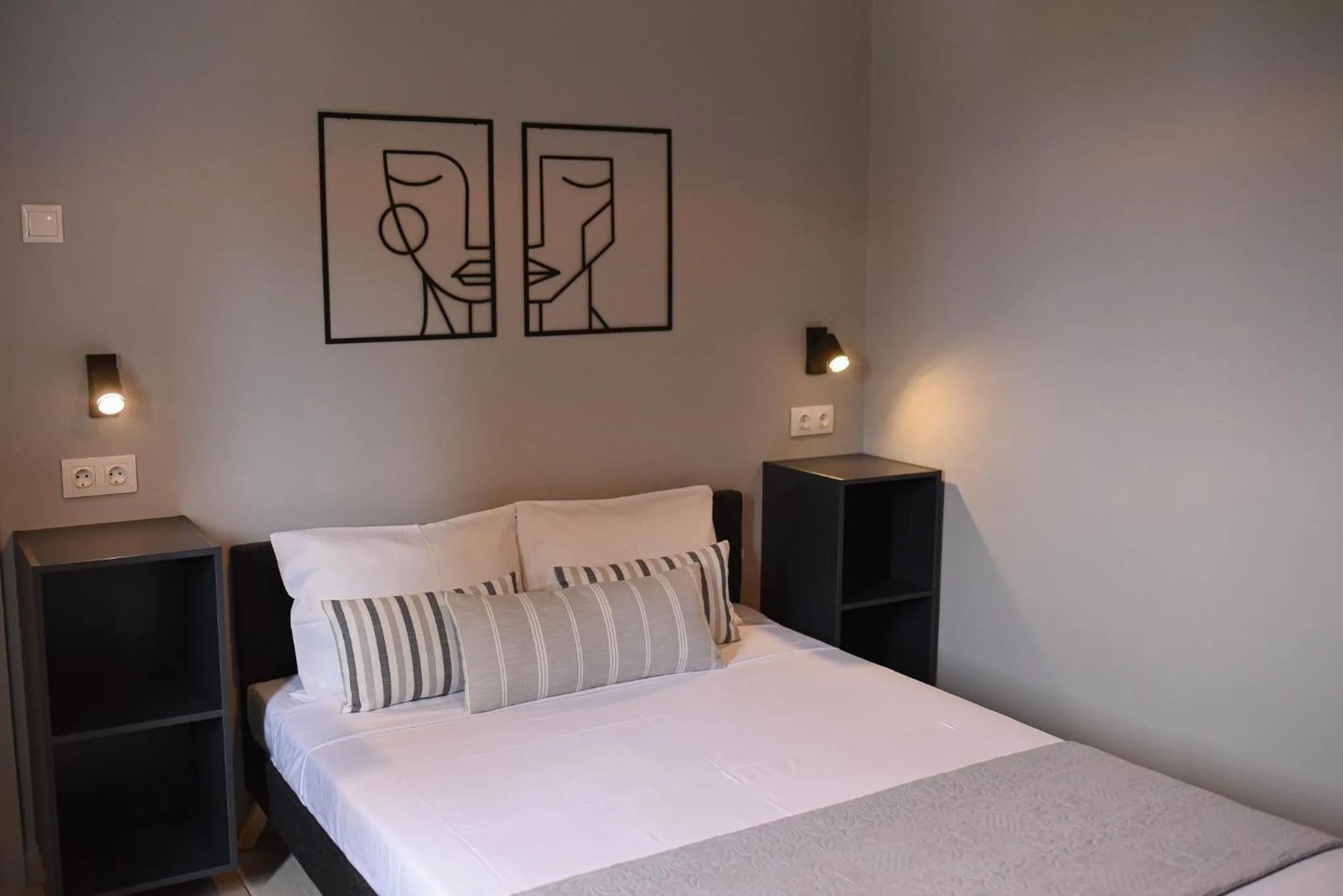 Bed in Vasilios Marinos Rooms