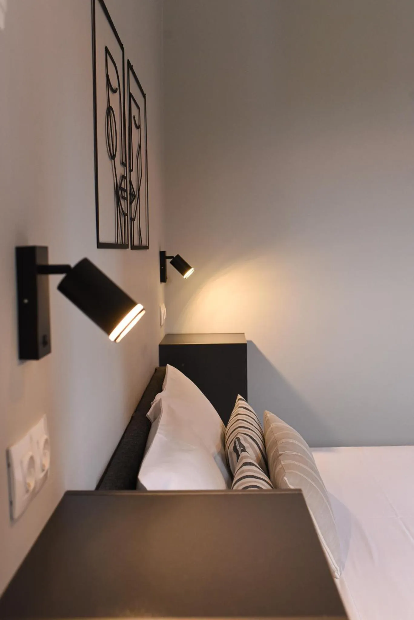 Bed in Vasilios Marinos Rooms