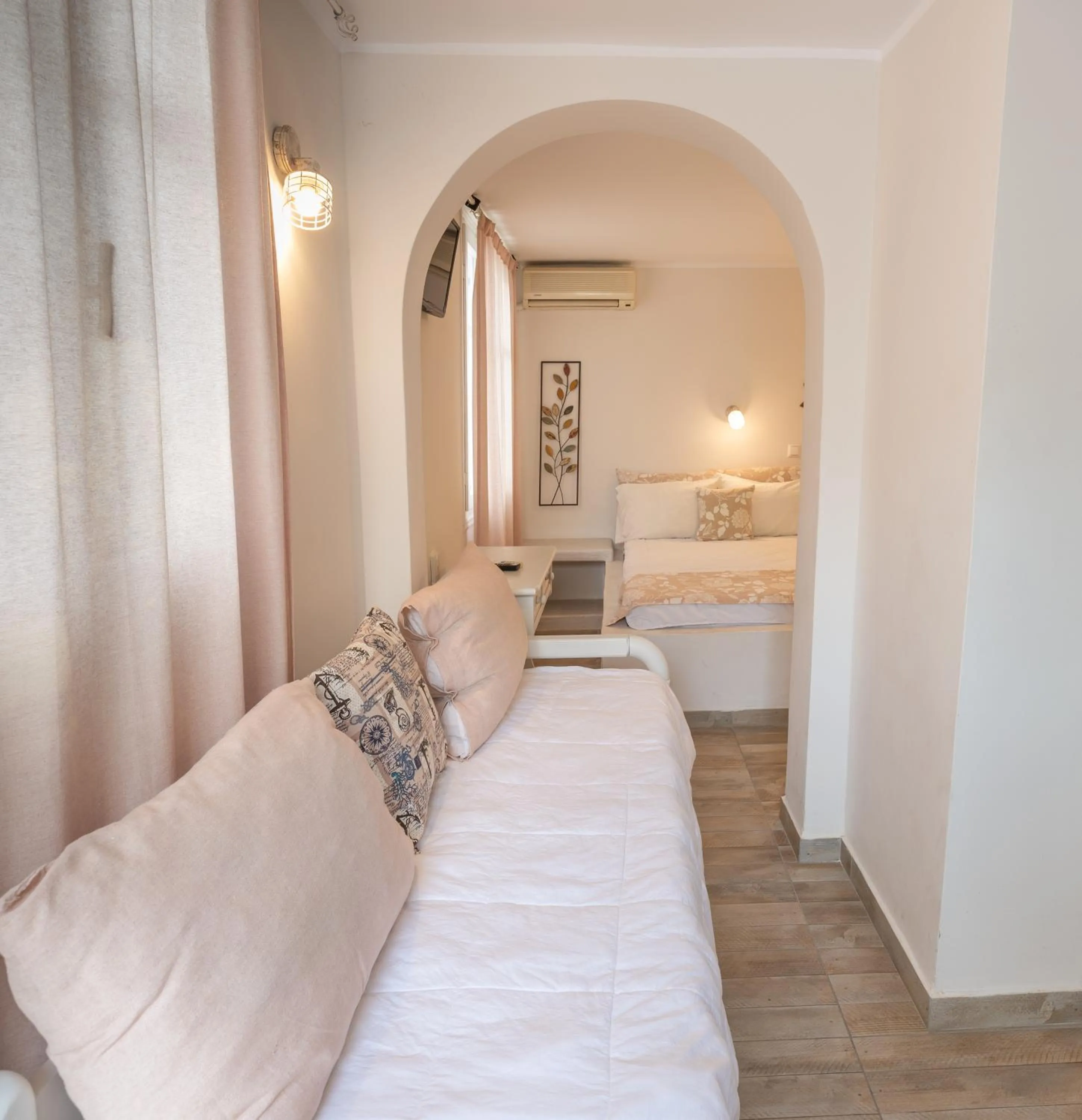Bed in Naxos Enjoy Apartments
