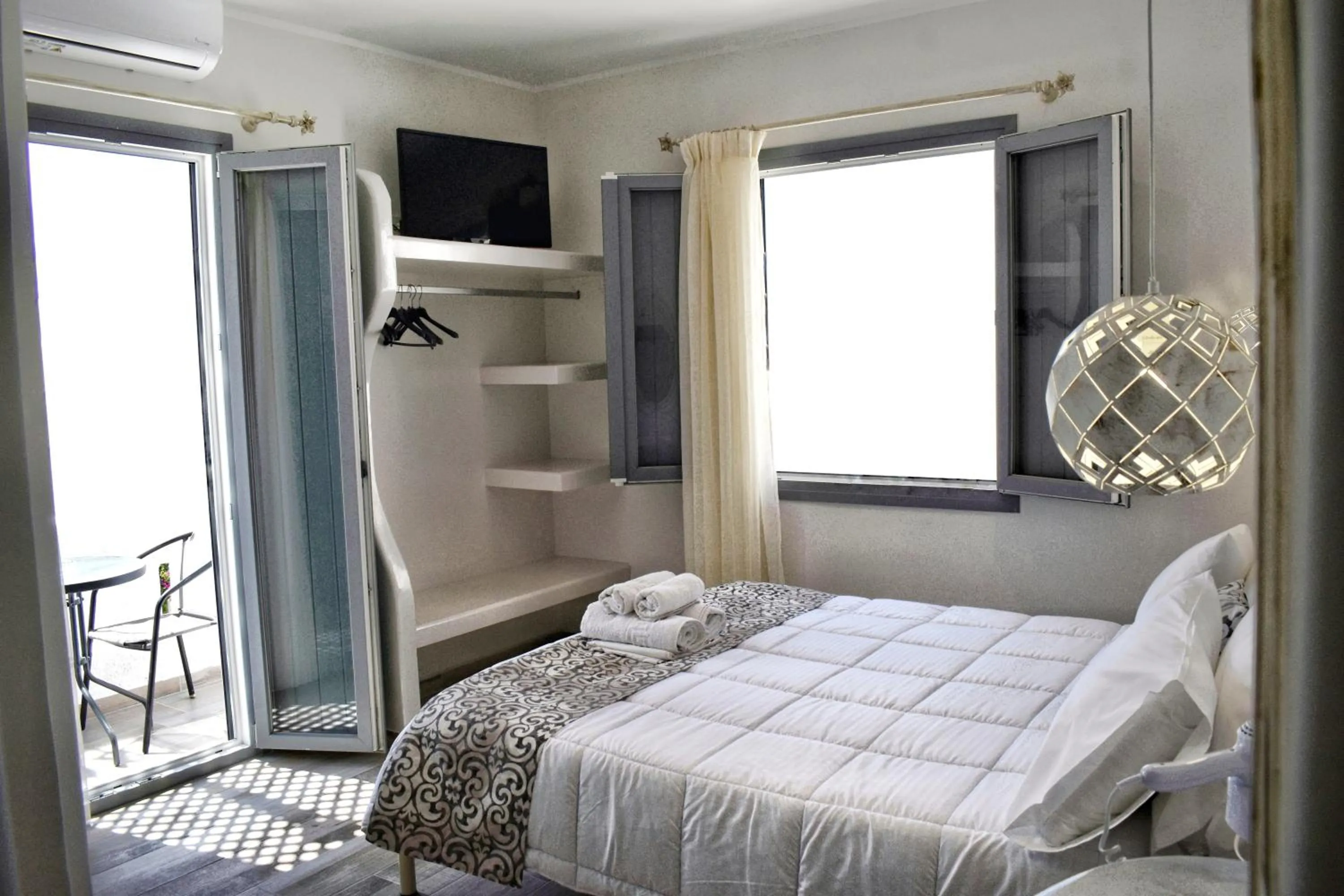 Bed in Naxos Enjoy Apartments