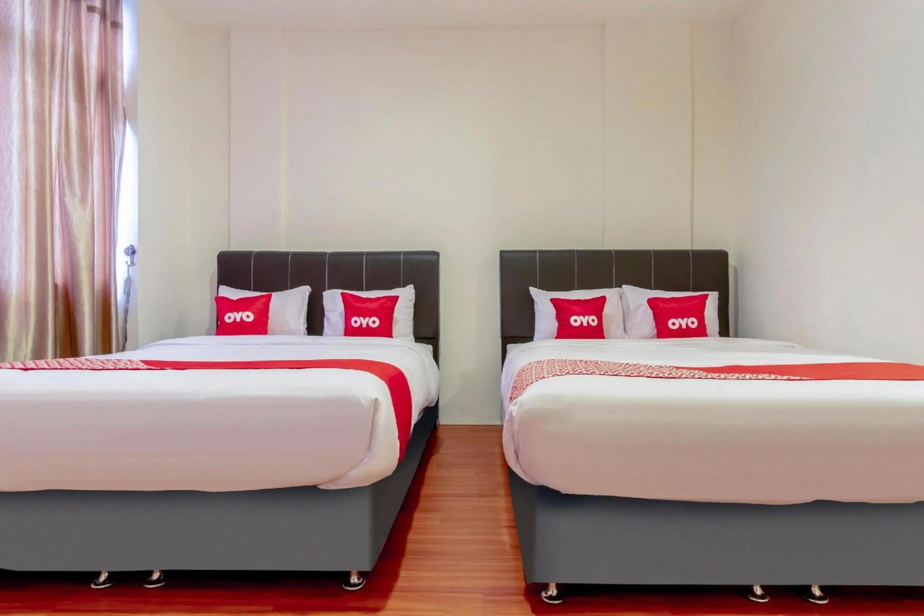 Photo of the whole room, Bed in Collection O Medan City Near Rsud Dr Pirngadi Formerly Tmj Guest House