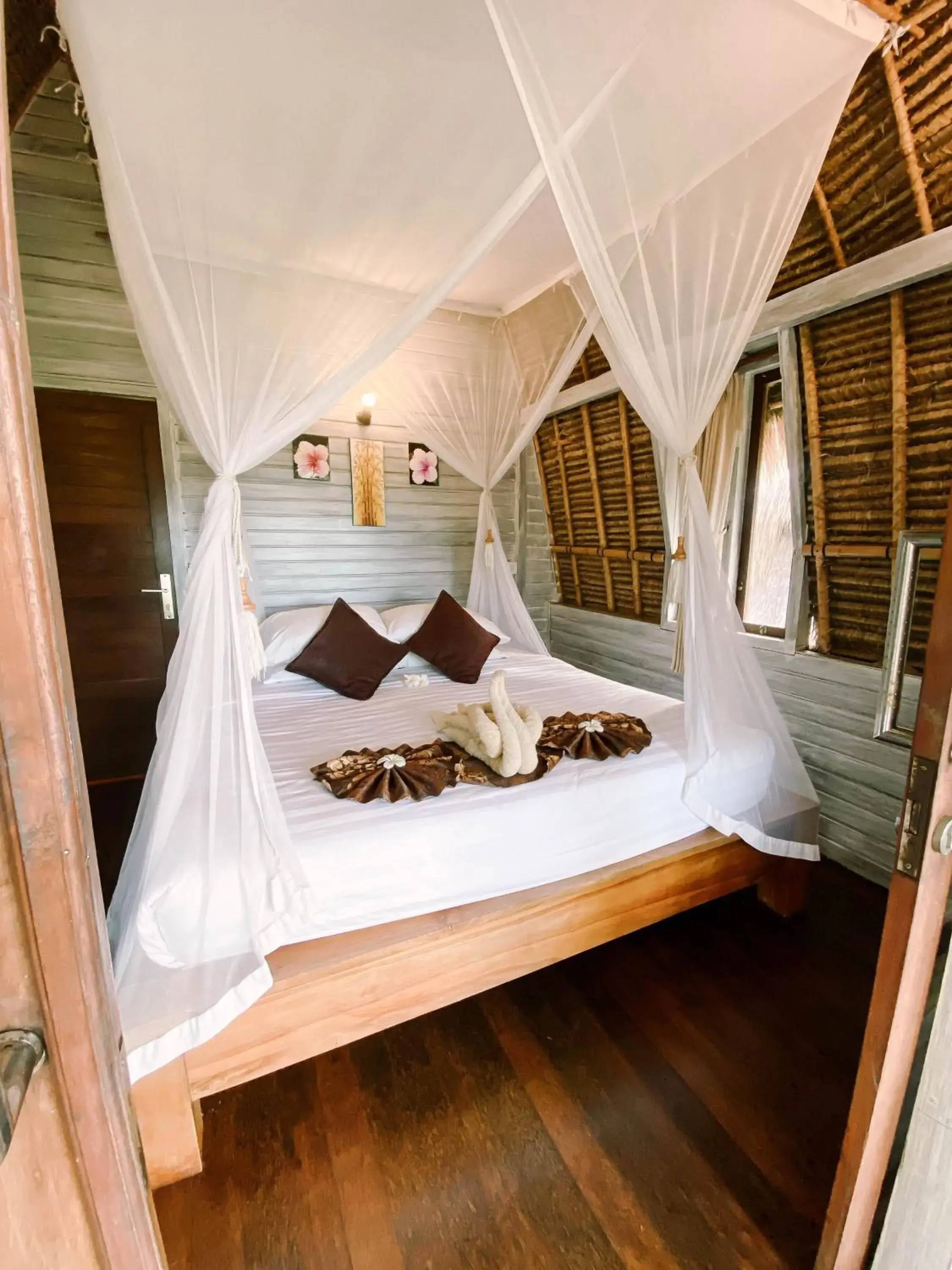 Bedroom, Bed in Abian Huts Dream Beach Lembongan Bedroom, Bed in Abian Huts Dream Beach Lembongan