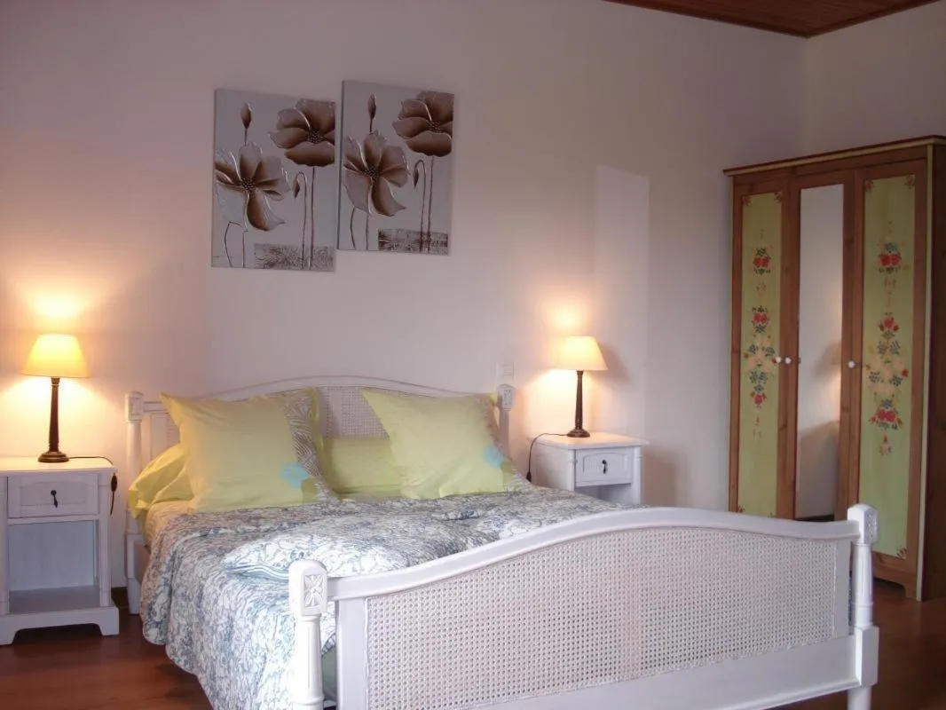 Bed in Chambre d'hôtes La Haie Fleurie