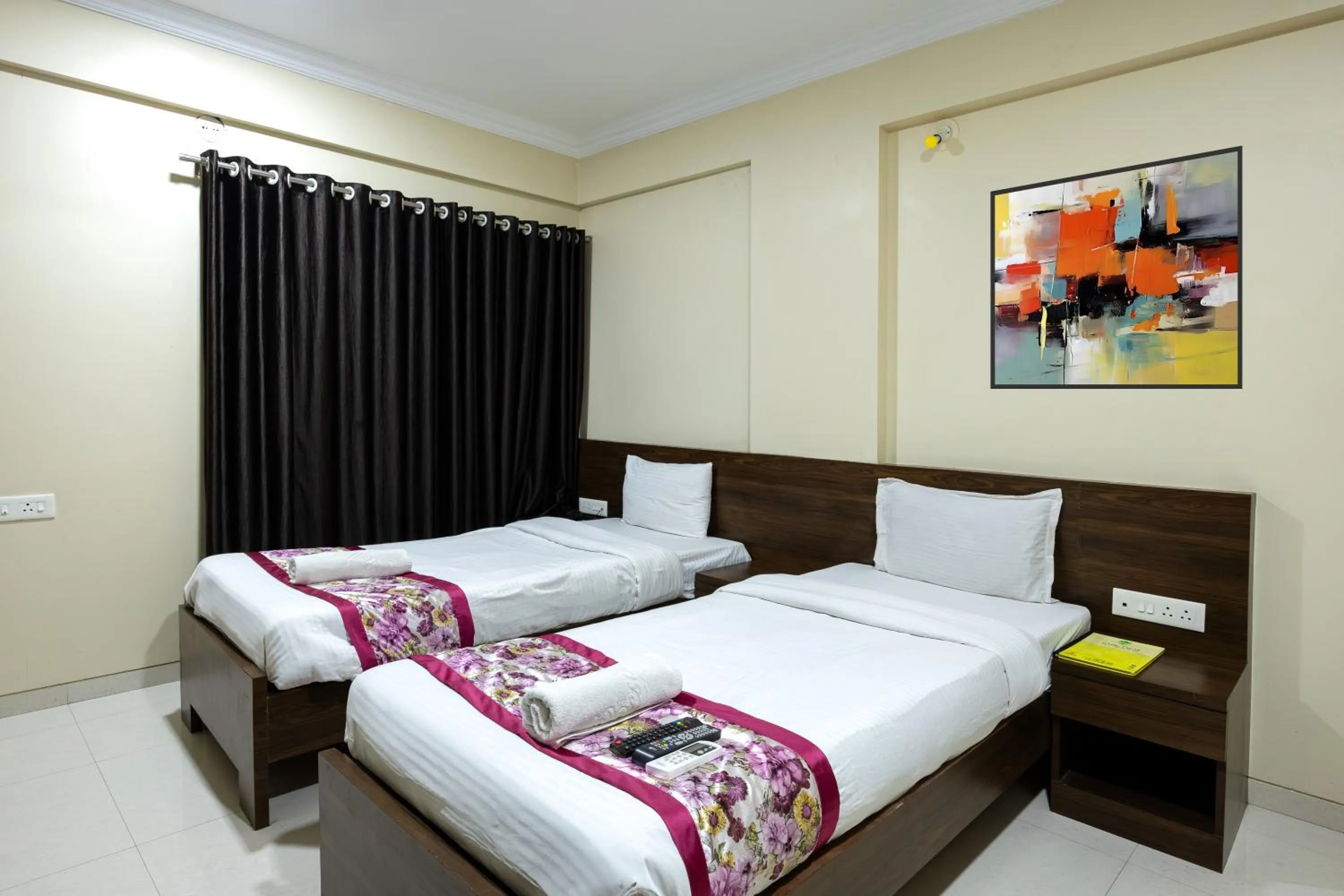 Bed in Kedari Residency