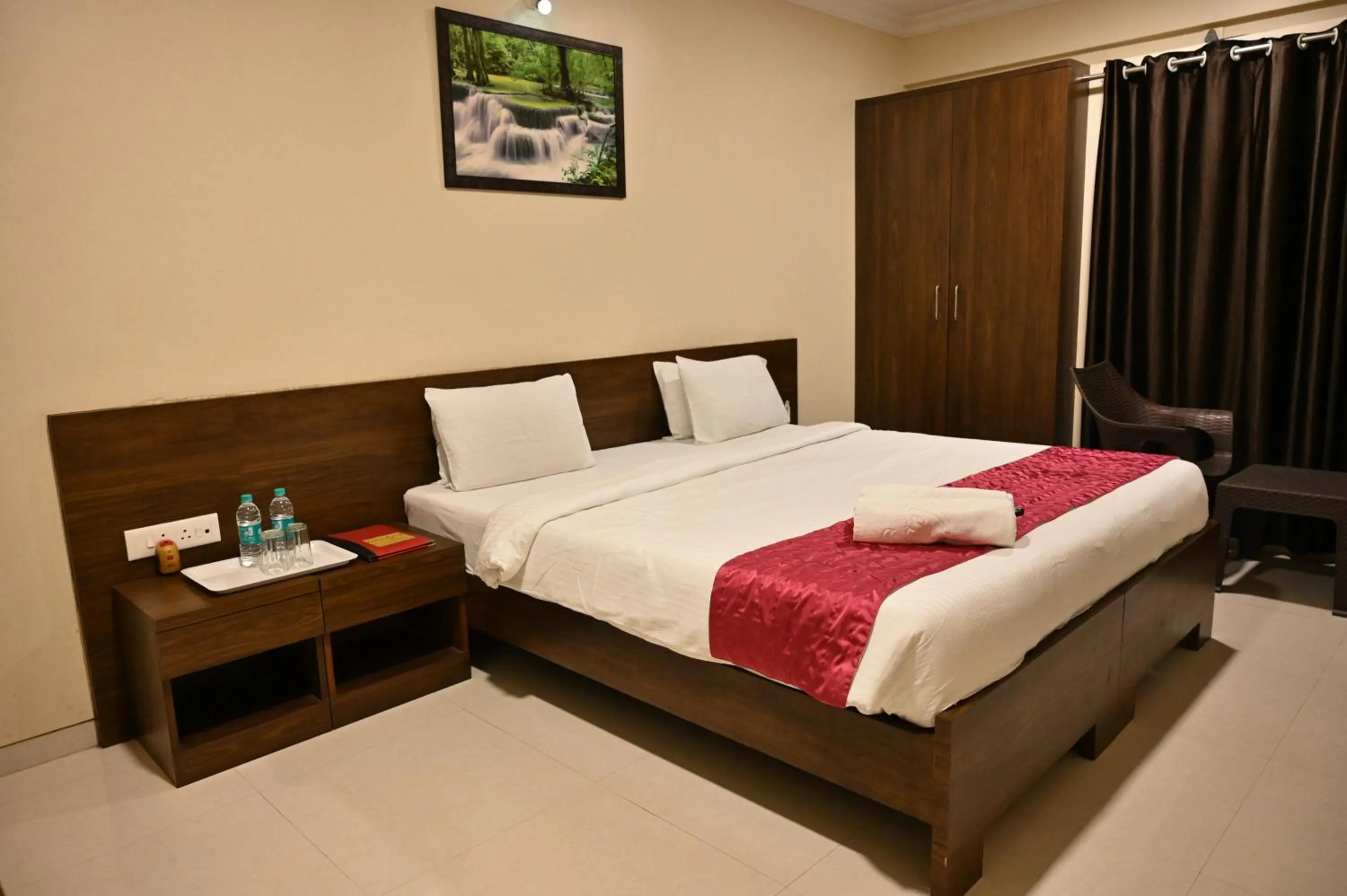 Bed in Kedari Residency