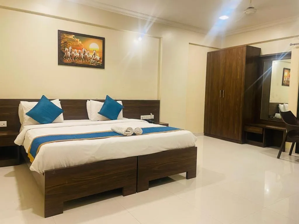 Bed in Kedari Residency