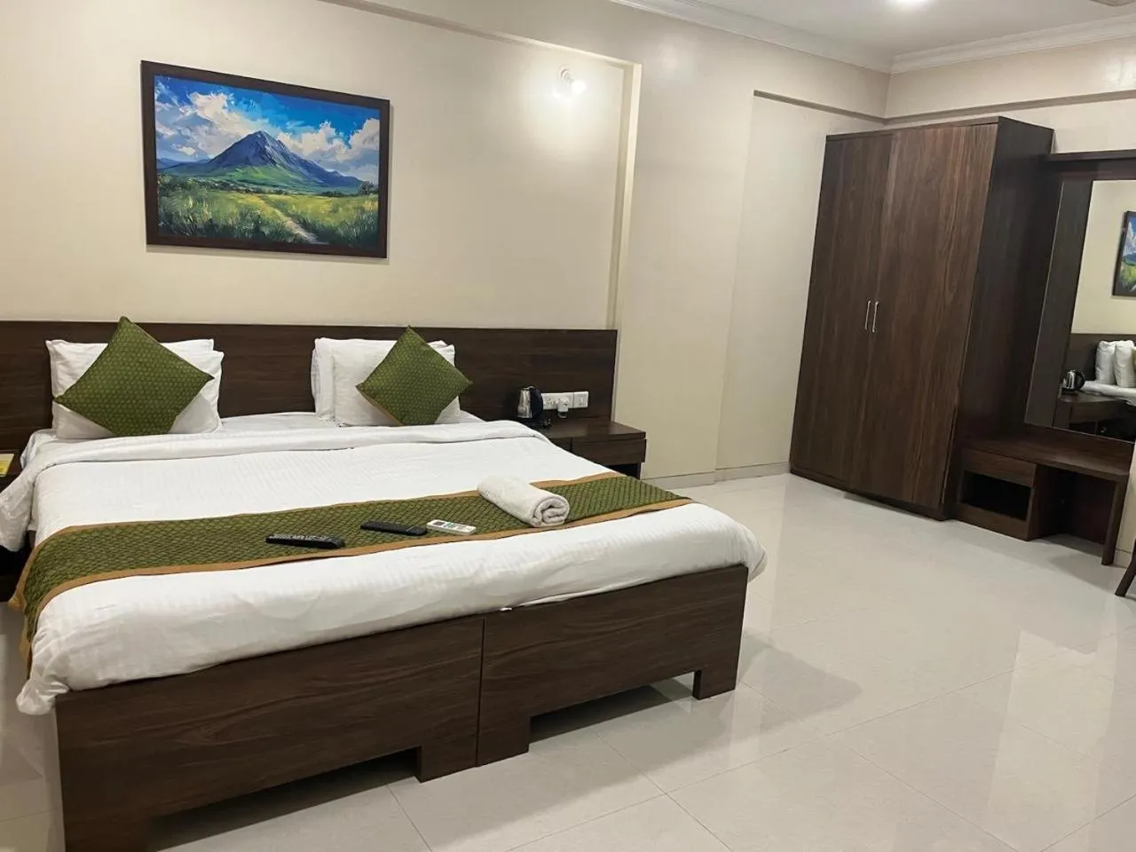 Bed in Kedari Residency