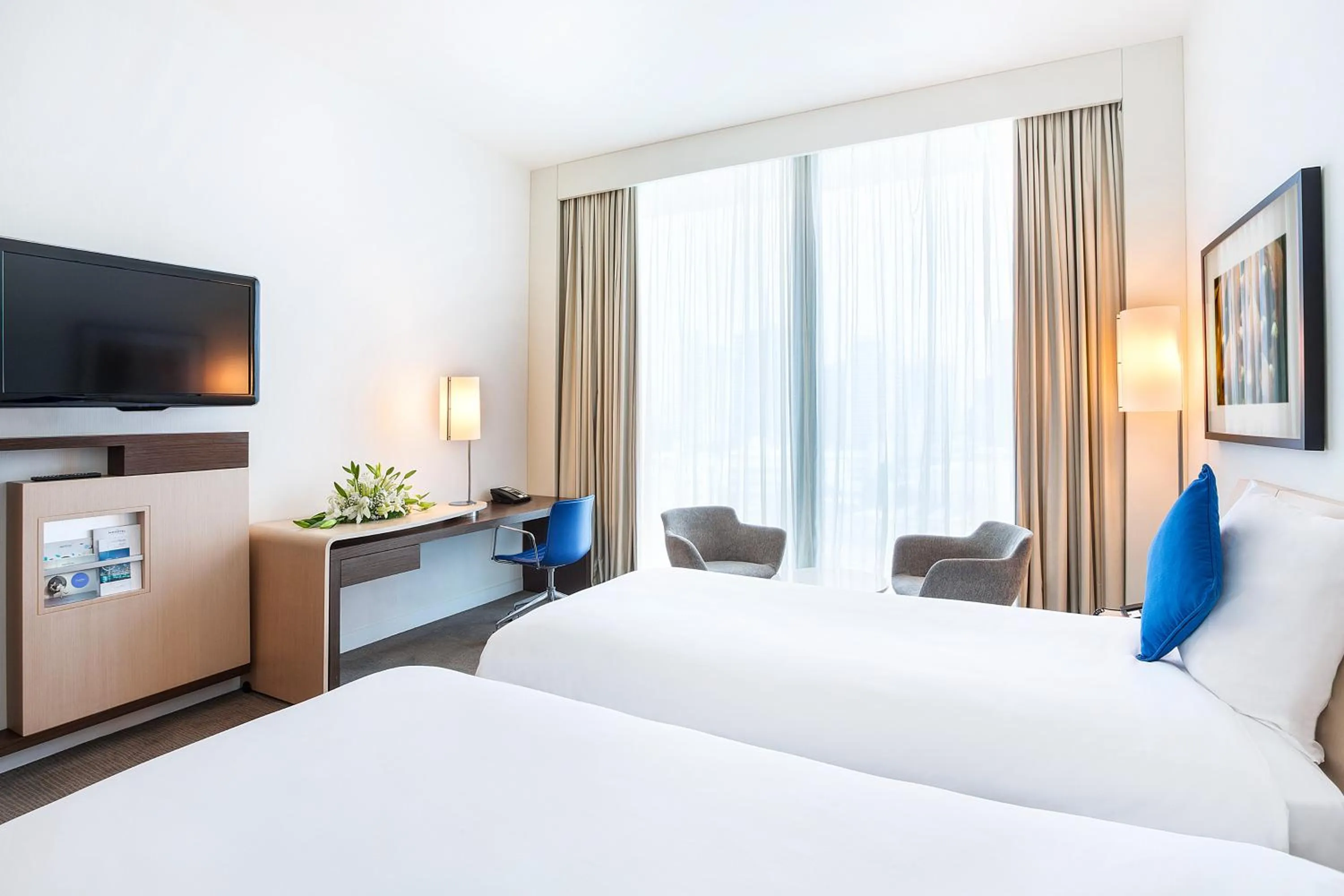 Seating area, Bed in Novotel Abu Dhabi Al Bustan