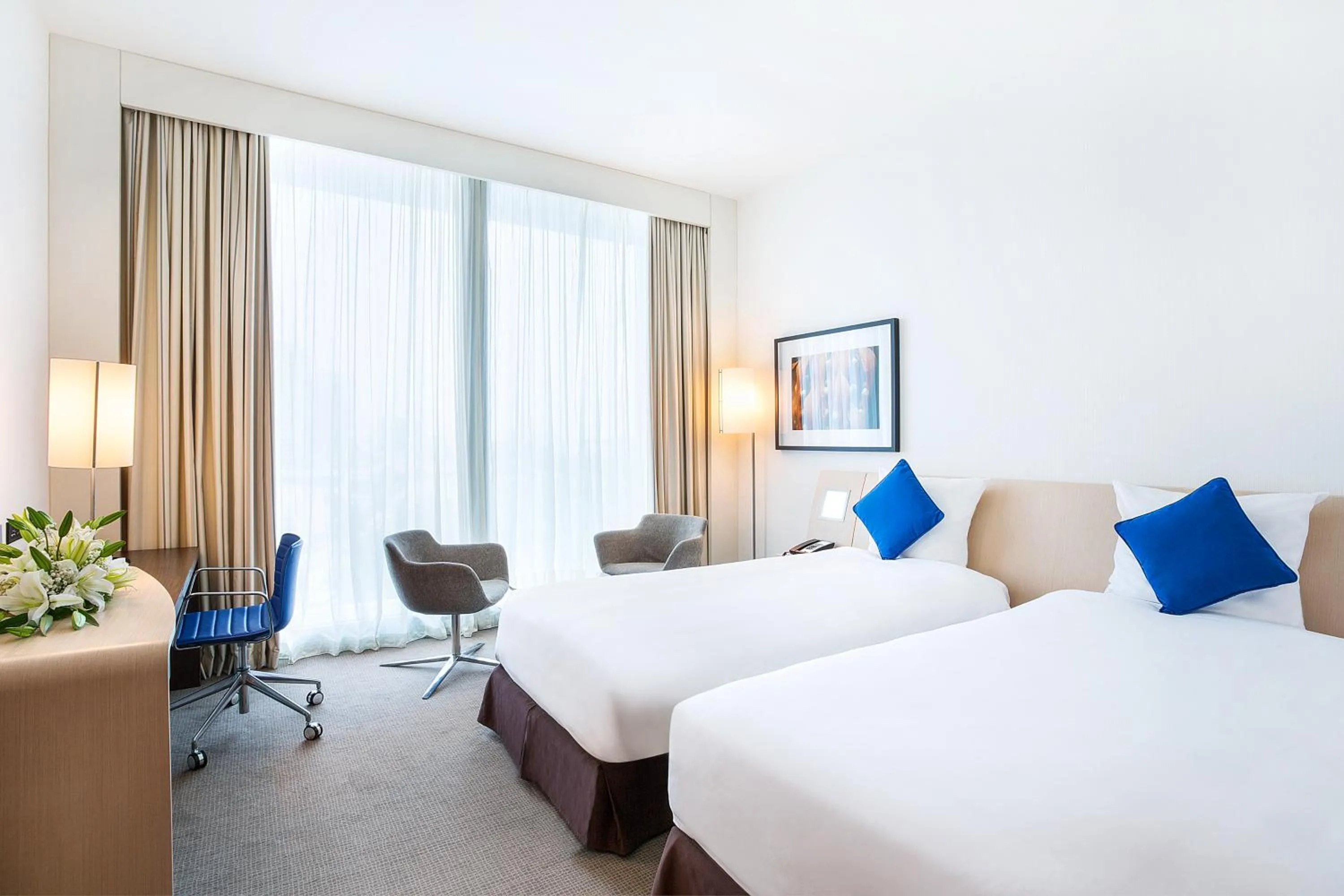 Seating area, Bed in Novotel Abu Dhabi Al Bustan