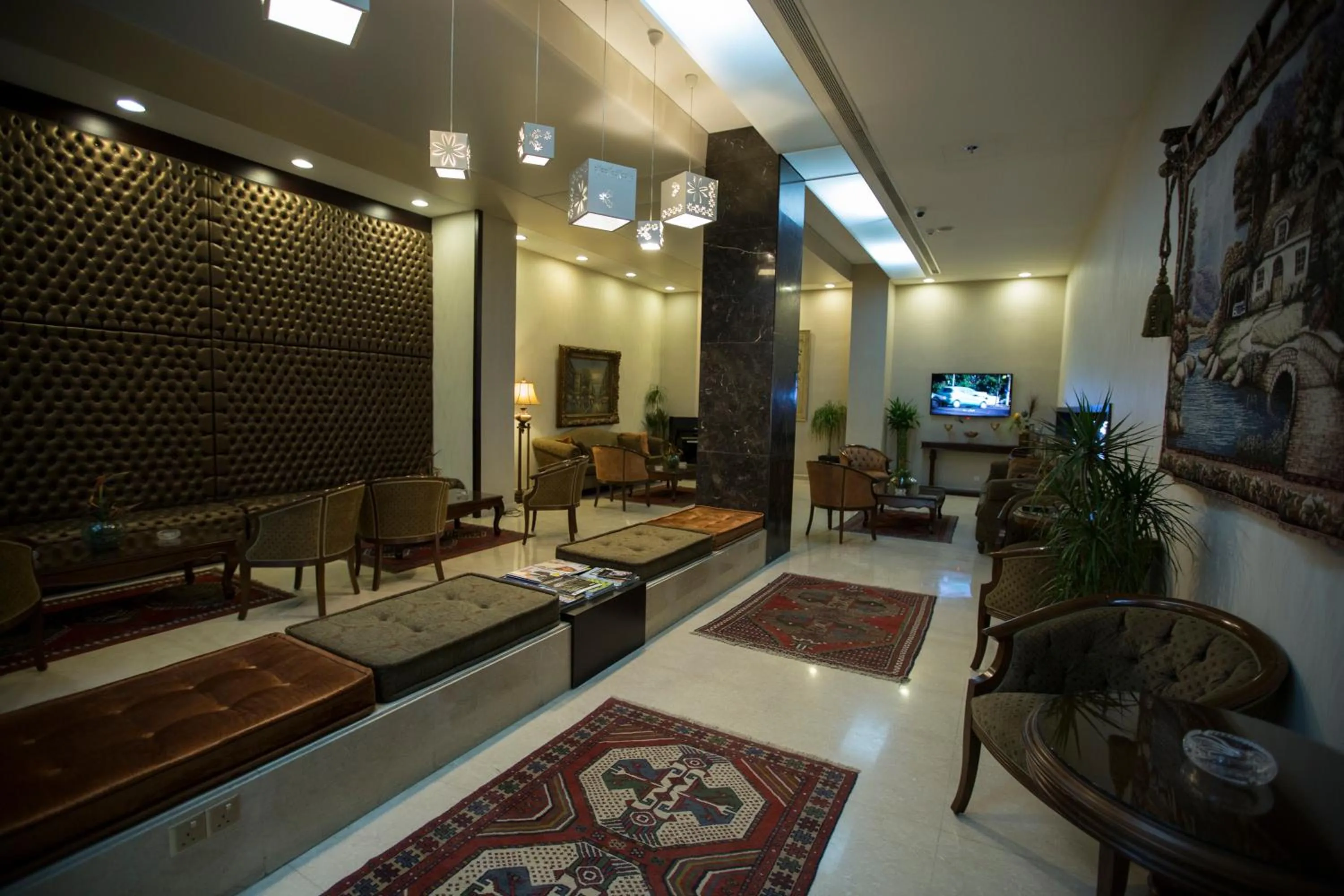 Communal lounge/ TV room in Fiori Hotel