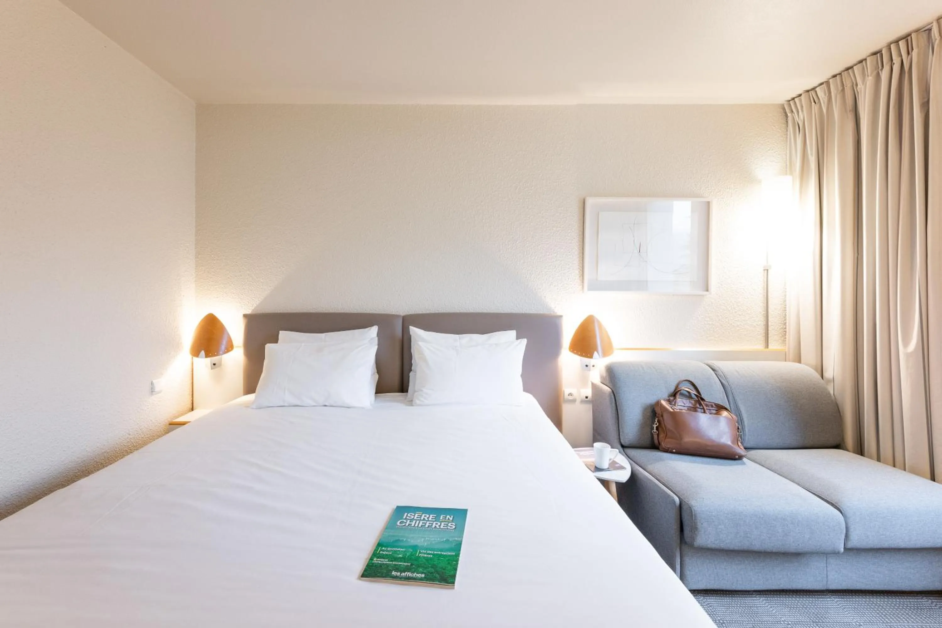 Photo of the whole room, Bed in Novotel Grenoble Nord Voreppe