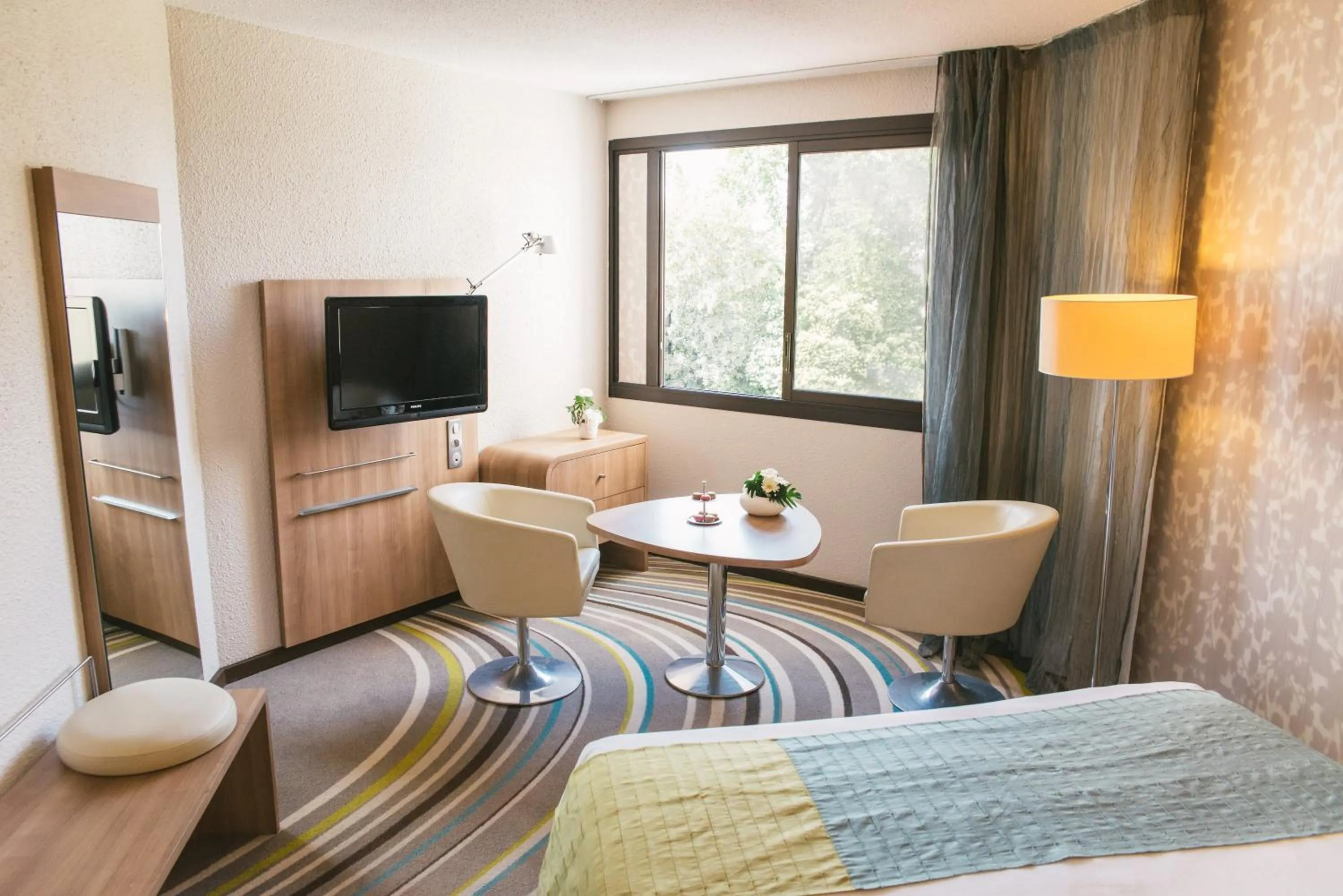 Photo of the whole room, Bed in Mercure Angers Centre de Congrès