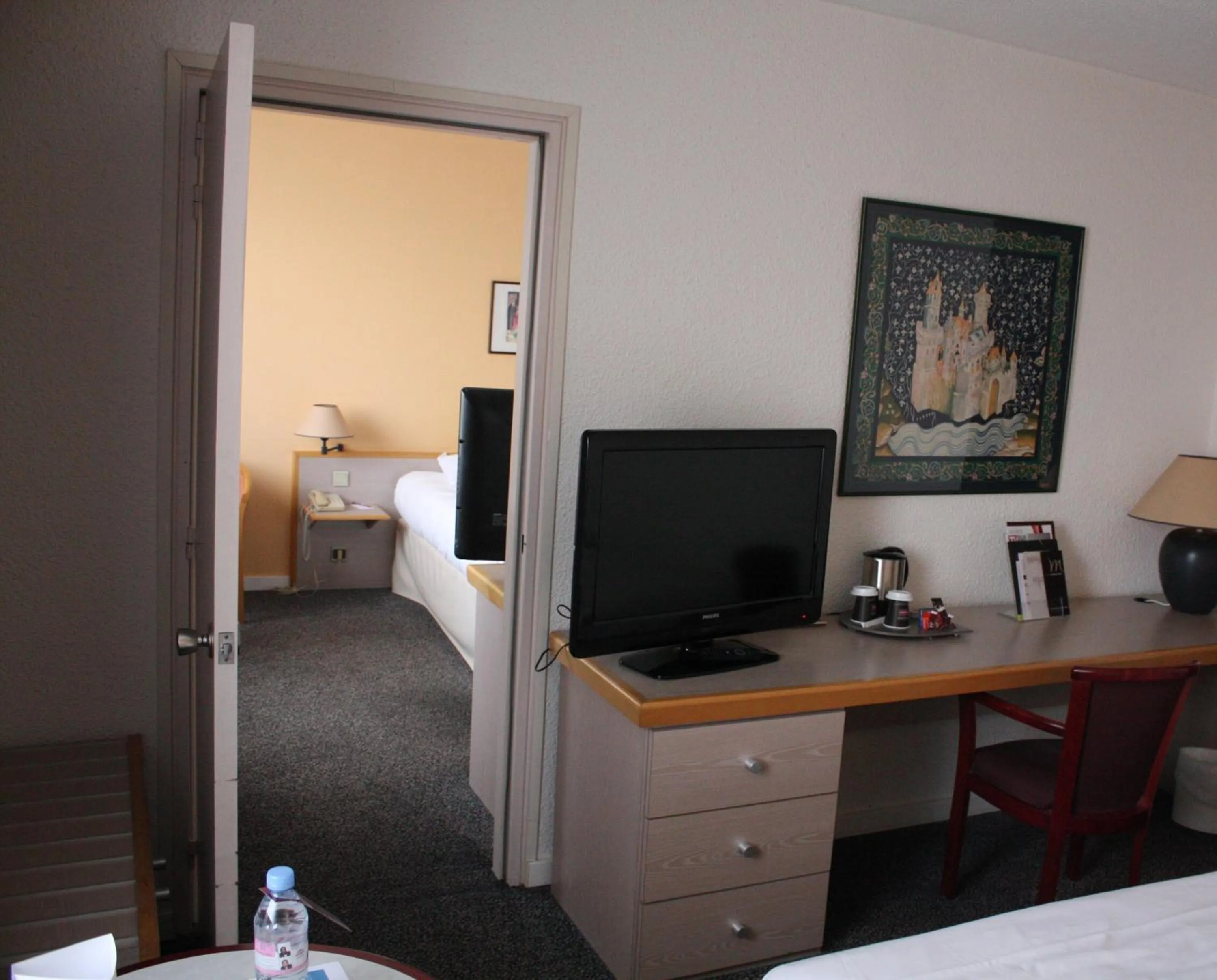 TV and multimedia, Bed in Mercure Angers Centre de Congrès