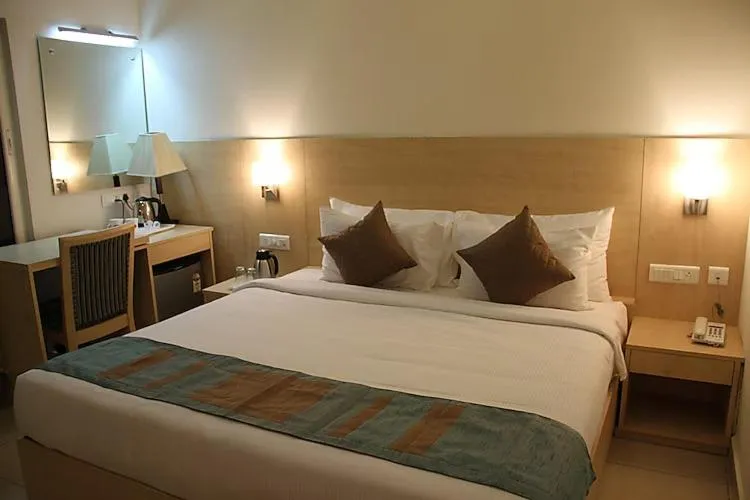 Bed in Hotel Southern Grand