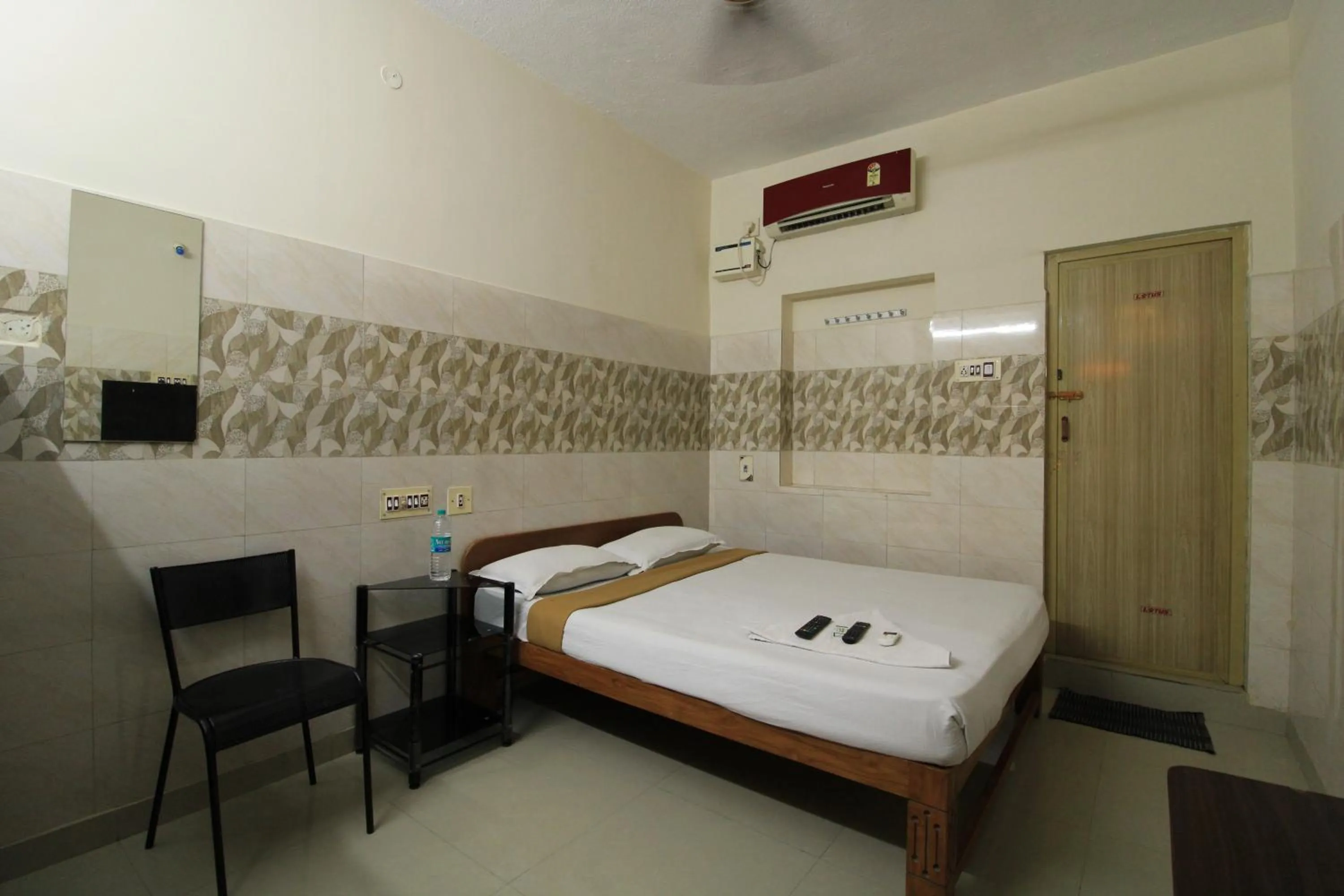 Bed in Just Guest House, Chennai Airport