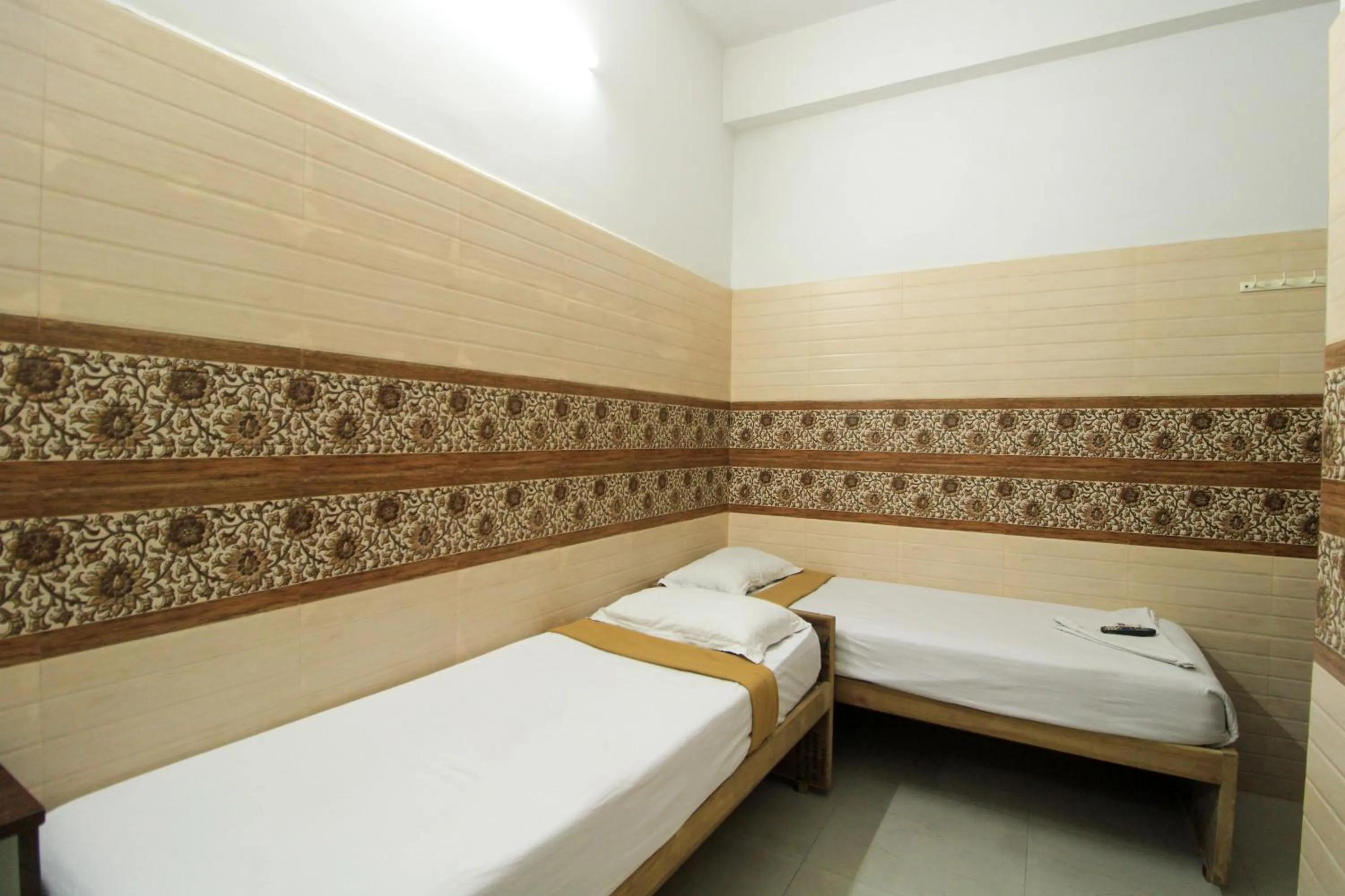 Bed in Just Guest House, Chennai Airport