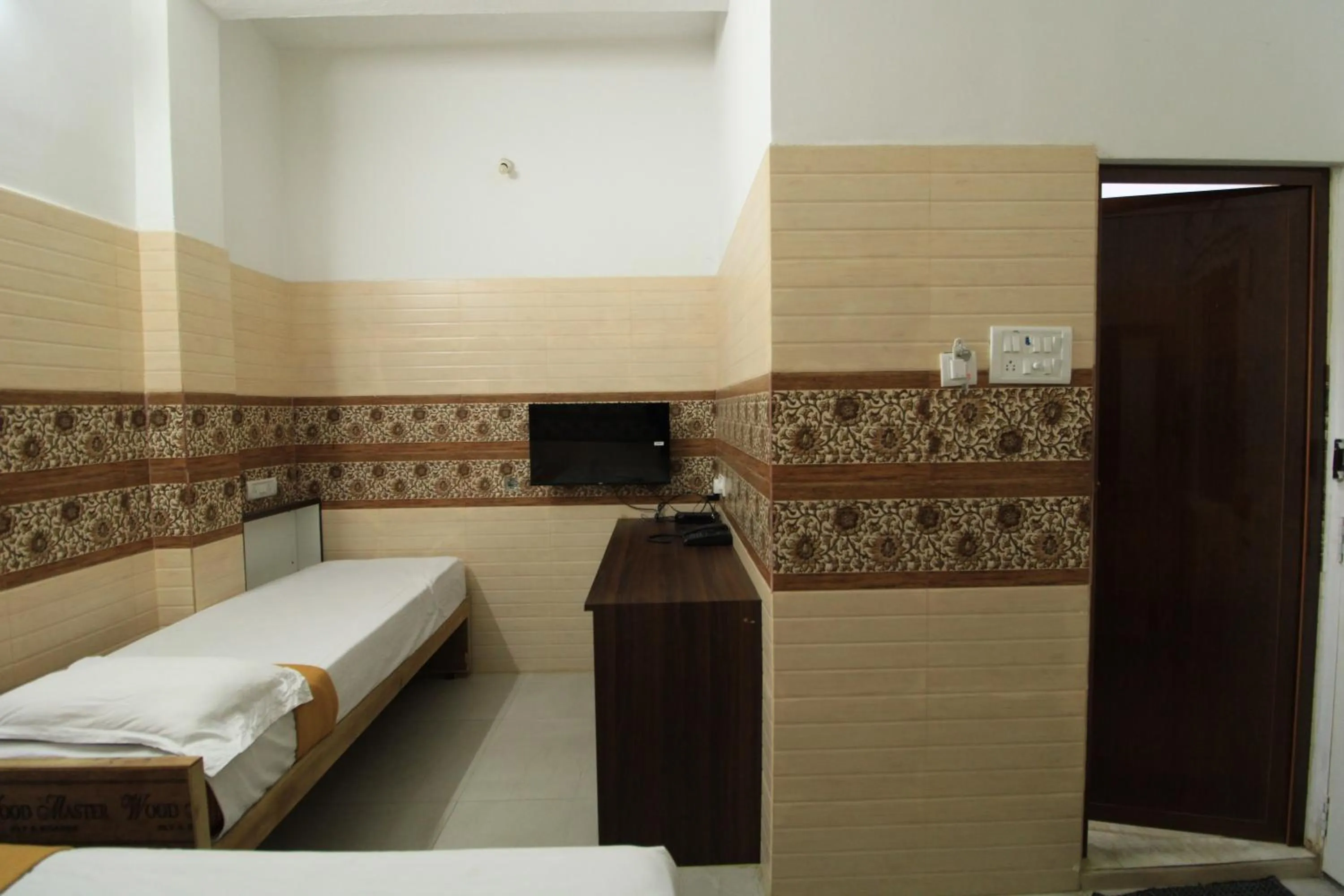 Bed in Just Guest House, Chennai Airport