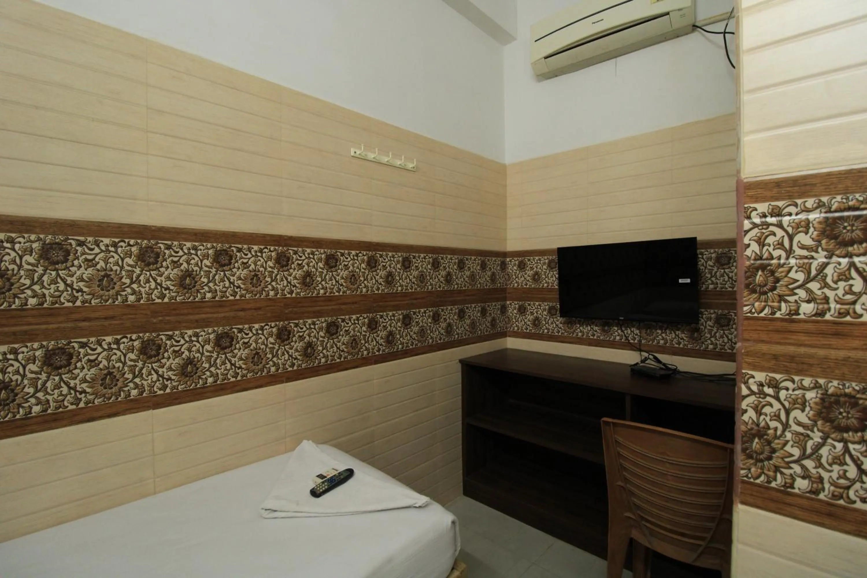 Bed in Just Guest House, Chennai Airport