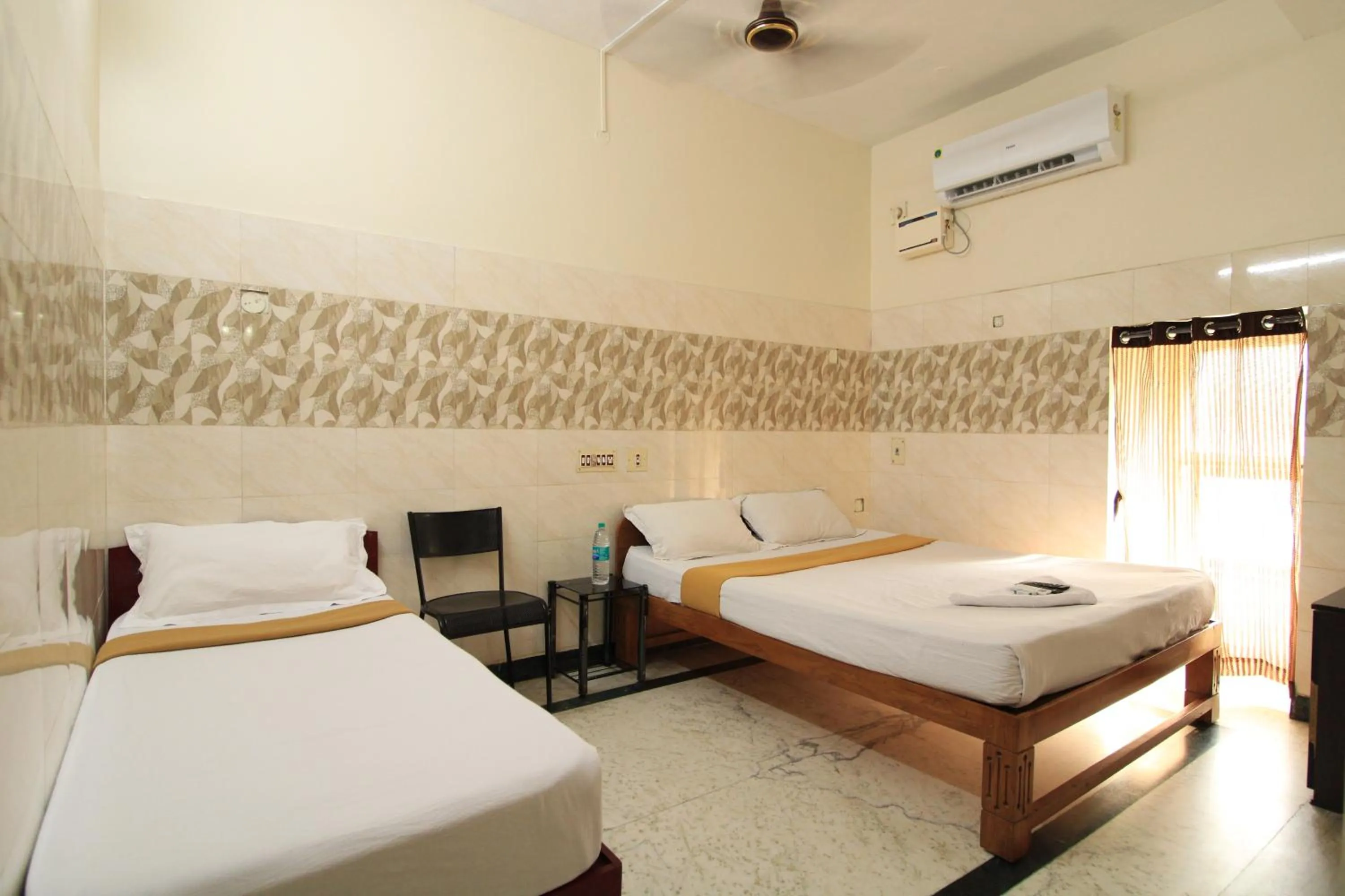 Bed in Just Guest House, Chennai Airport