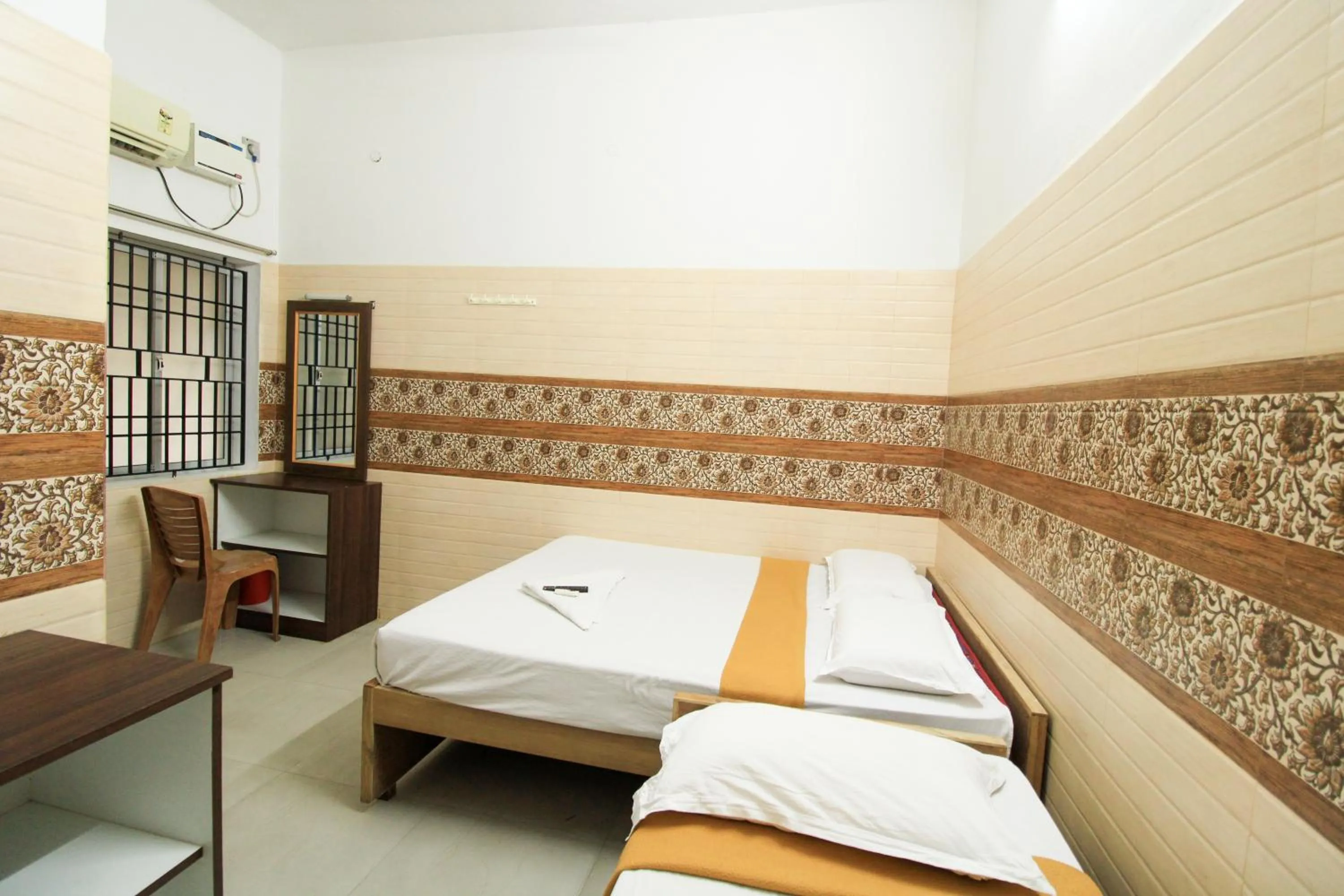 Photo of the whole room, Bed in Just Guest House, Chennai Airport