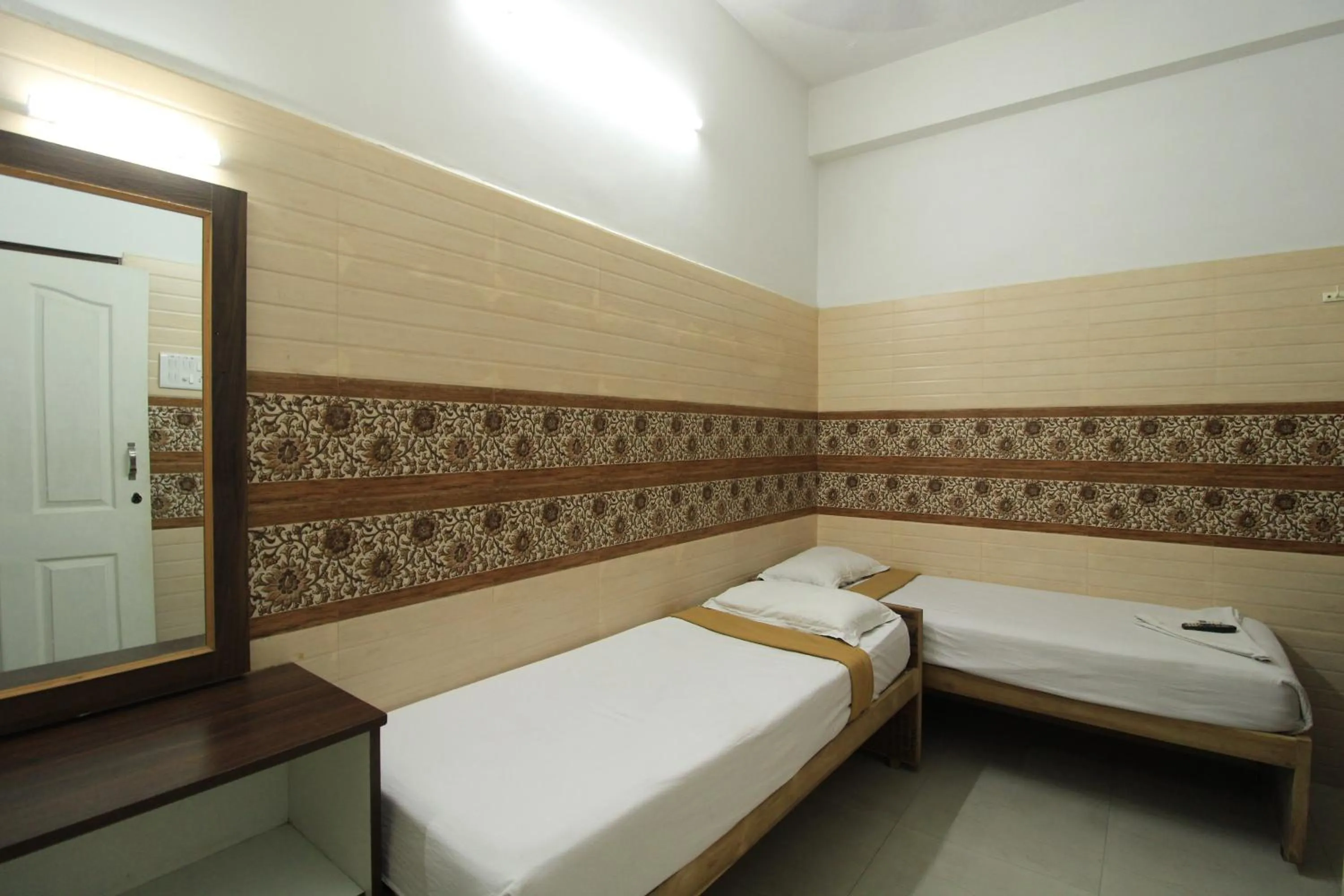 Bed in Just Guest House, Chennai Airport