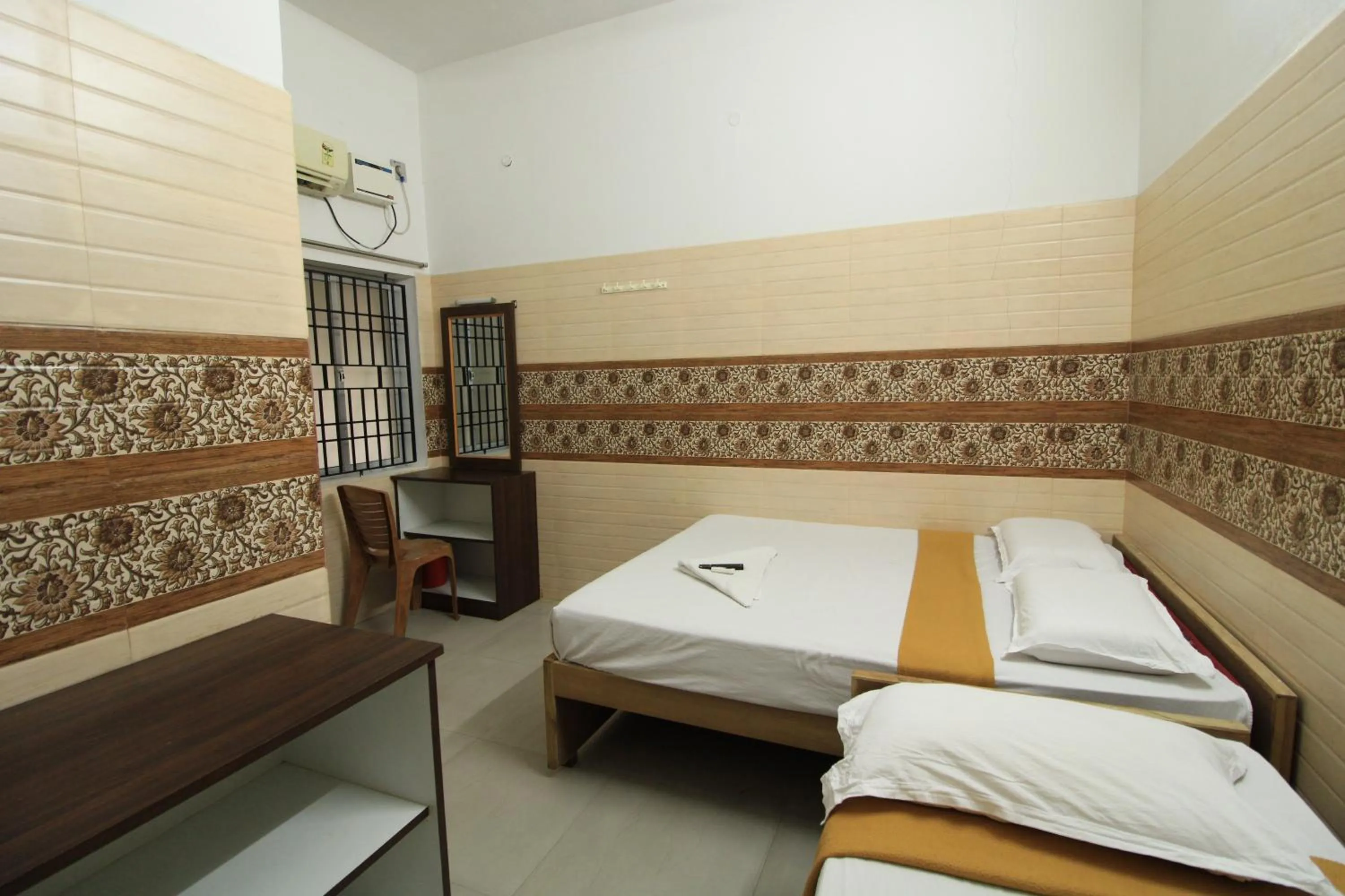 Bed in Just Guest House, Chennai Airport