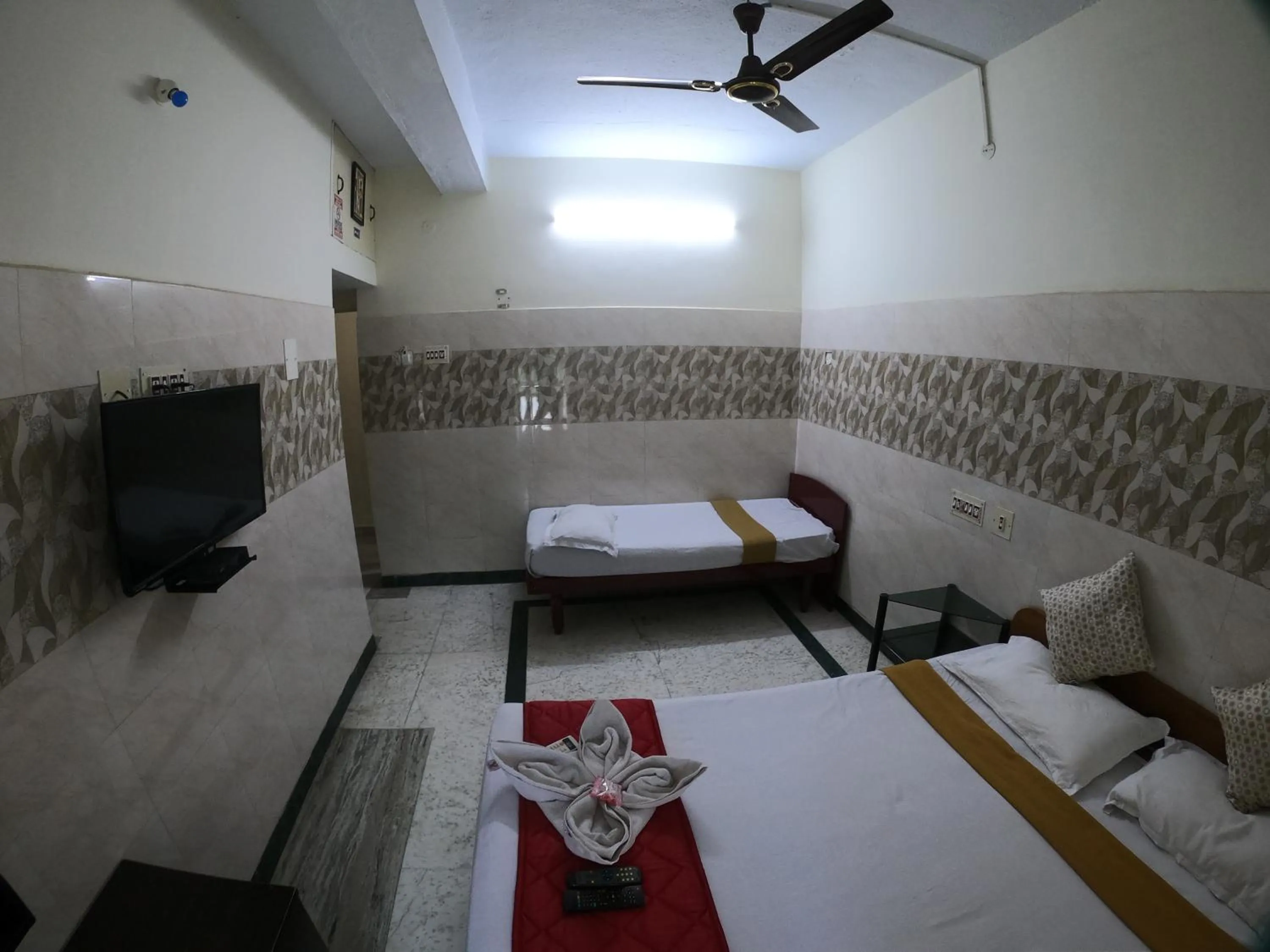 Photo of the whole room, Bed in Just Guest House, Chennai Airport