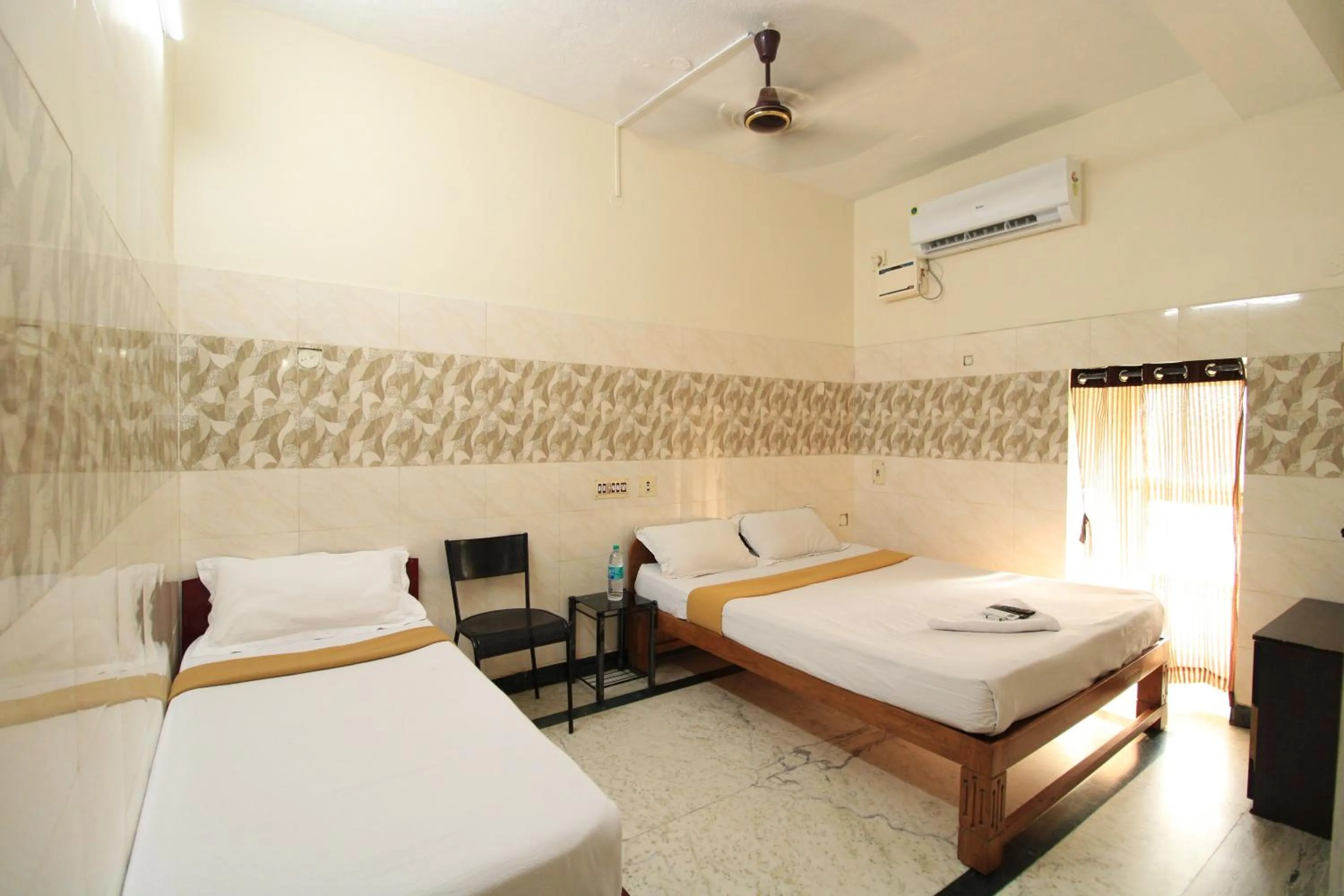 Bed in Just Guest House, Chennai Airport