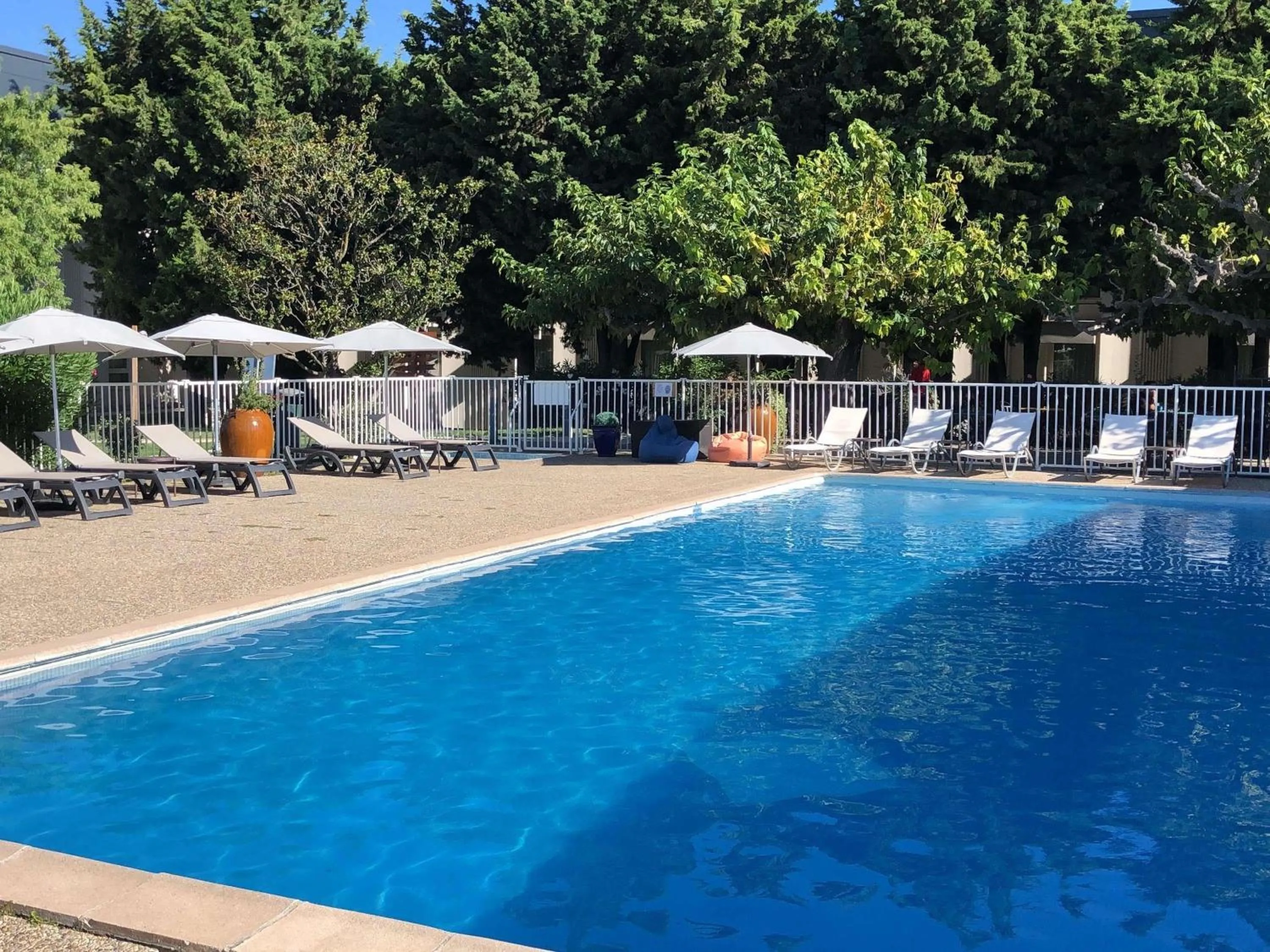 Pool view in ibis Styles Avignon Sud
