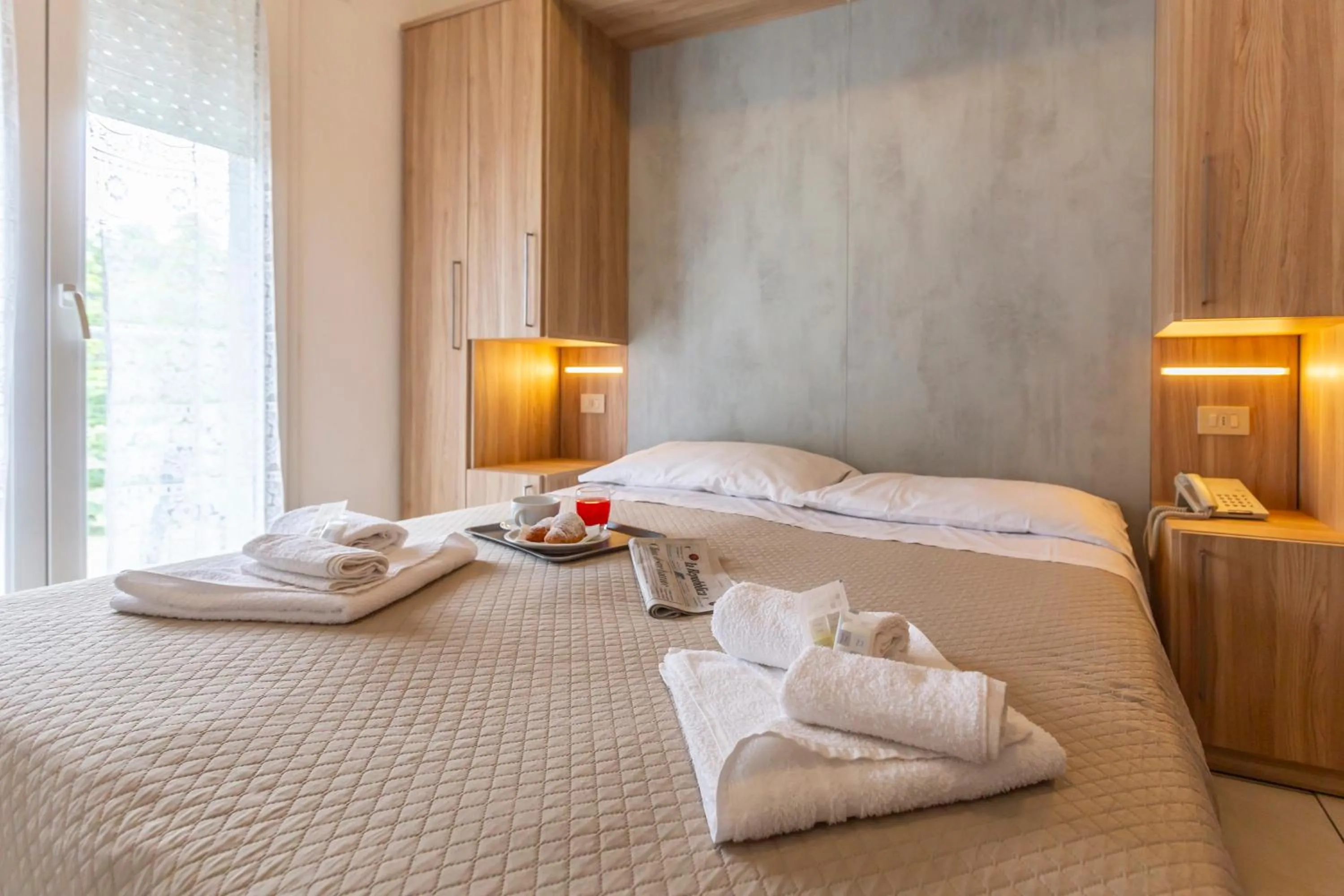Bed in Hotel Luana
