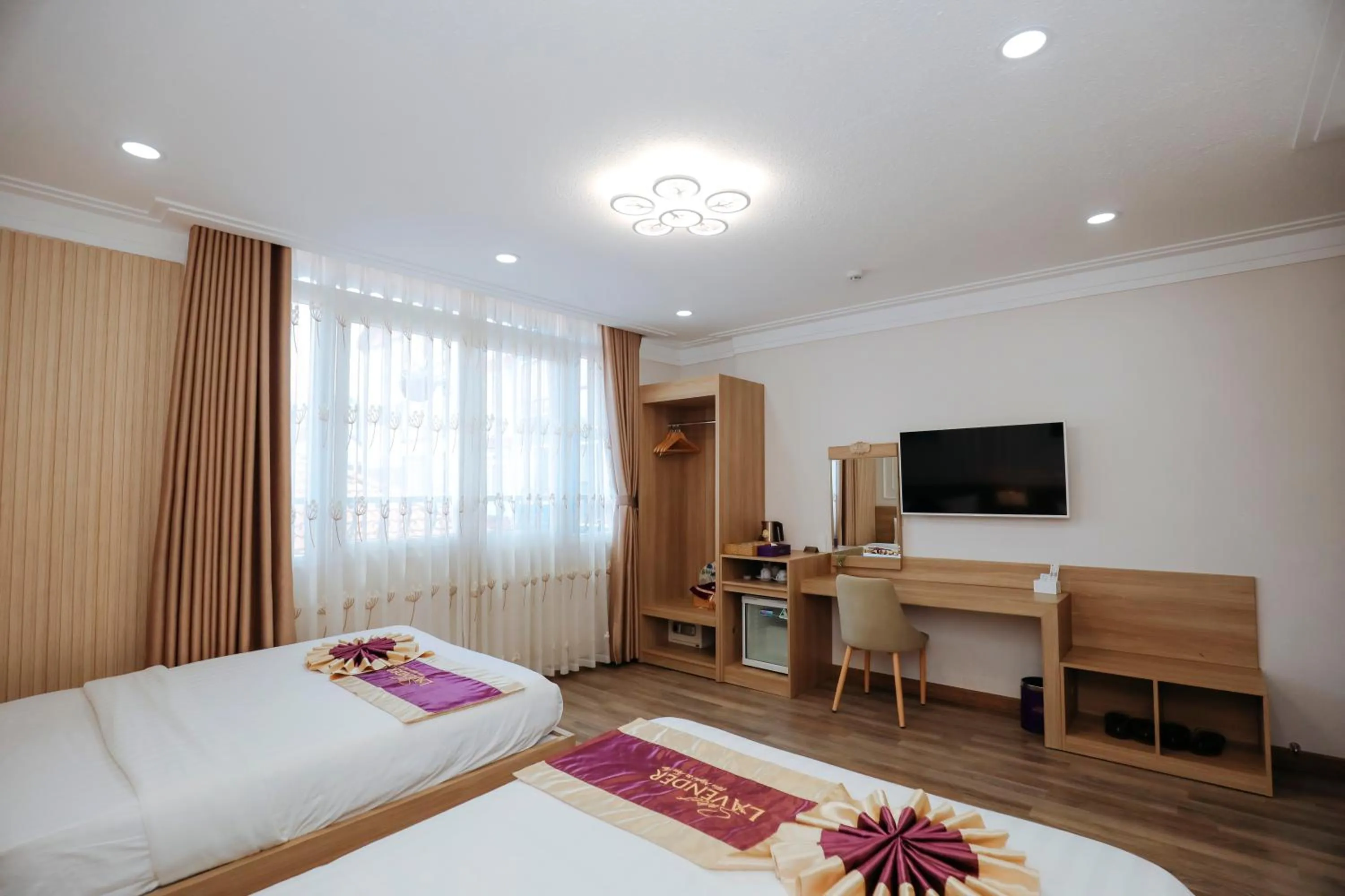 Communal lounge/ TV room, Bed in Sweet Lavender Hotel