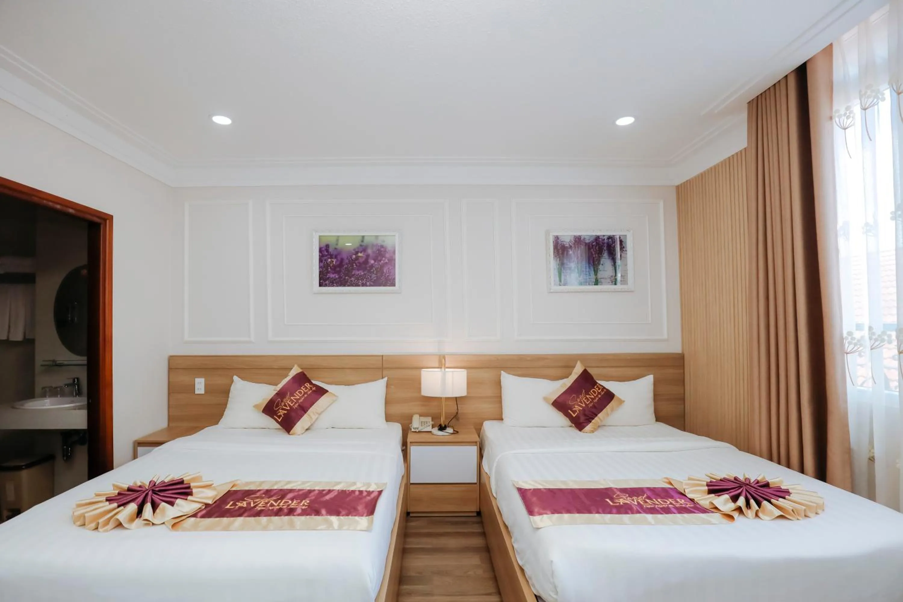 Bed in Sweet Lavender Hotel