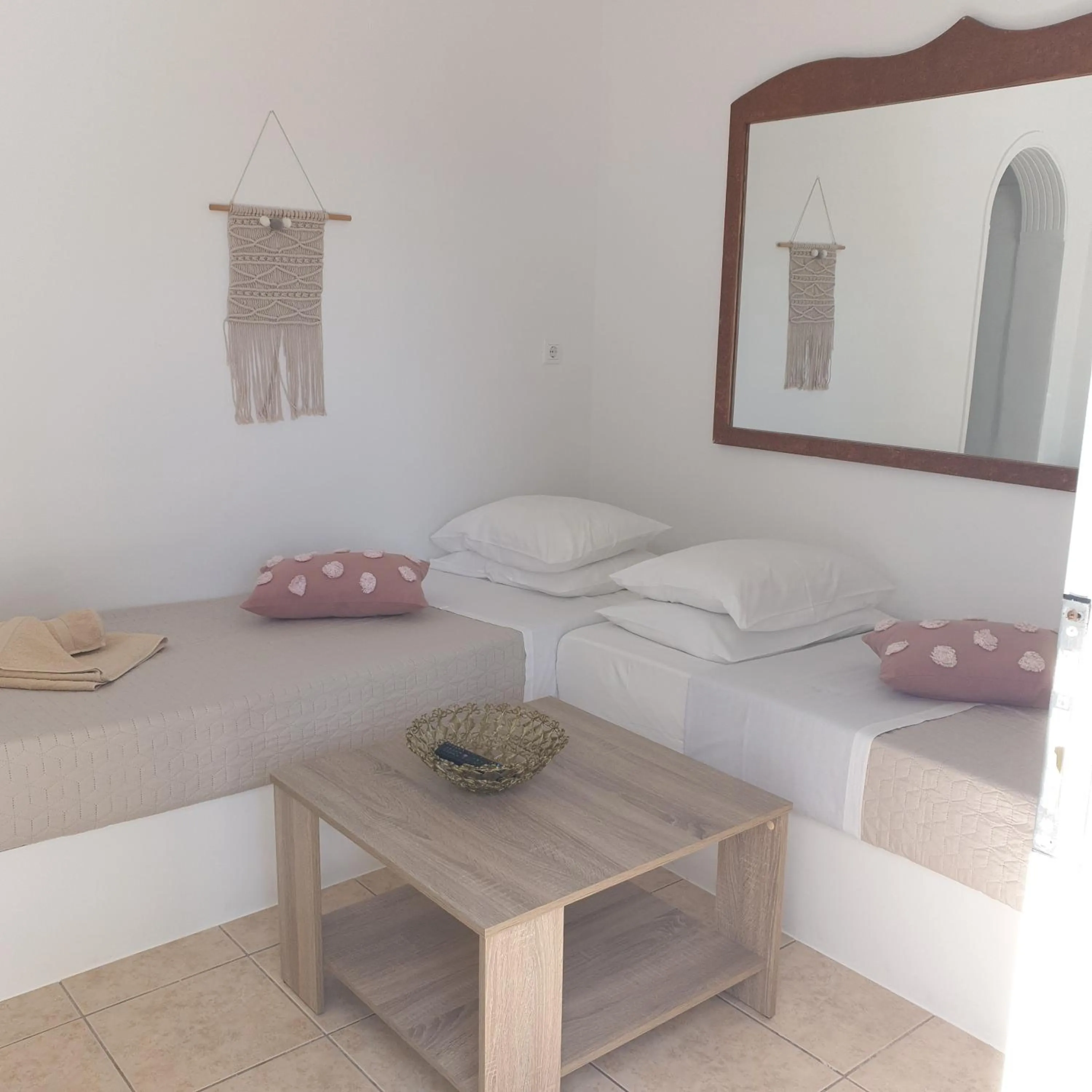 Bed in Sagma Central Rooms