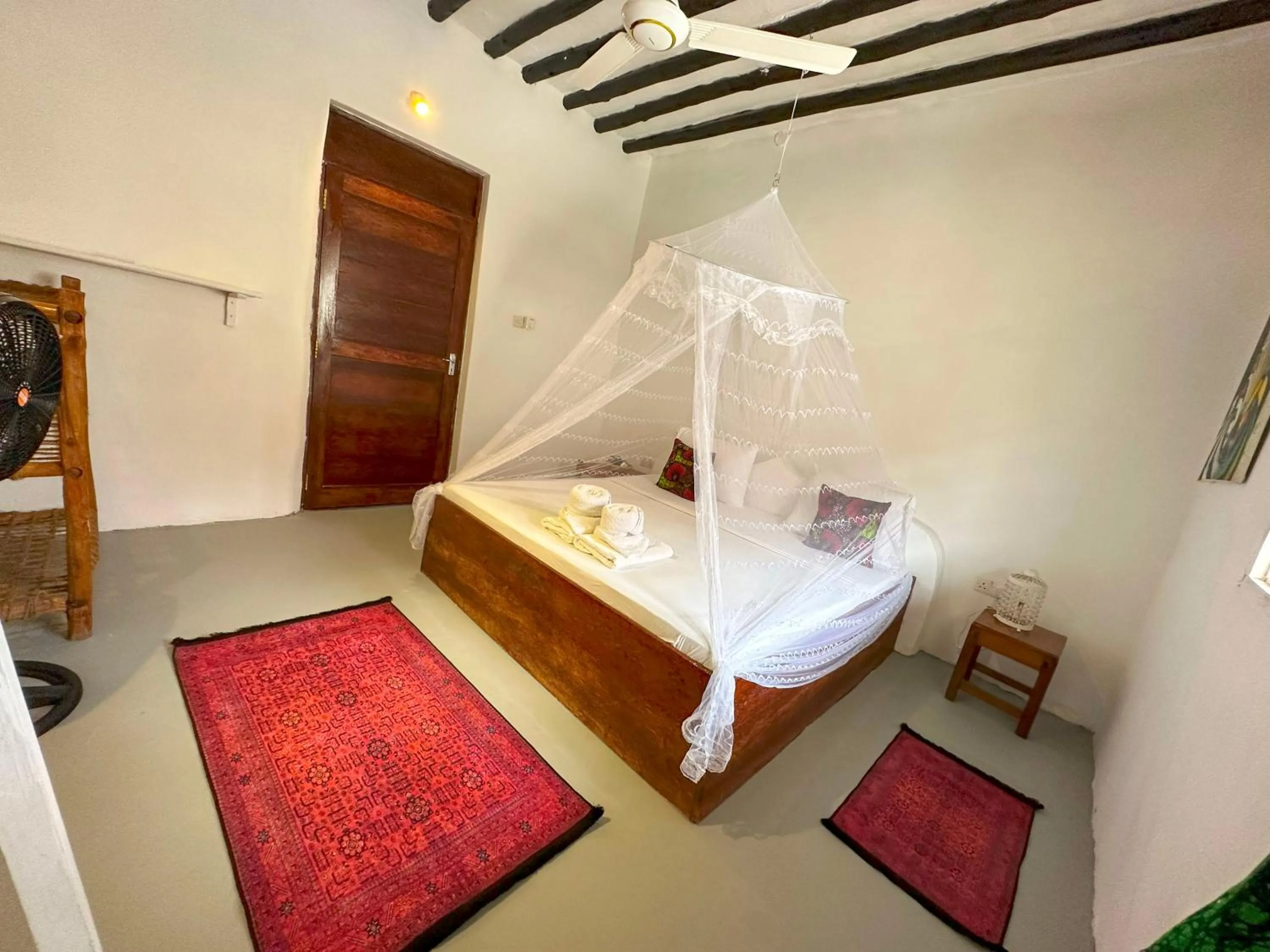 Bed in The African Paradise Beach Hotel