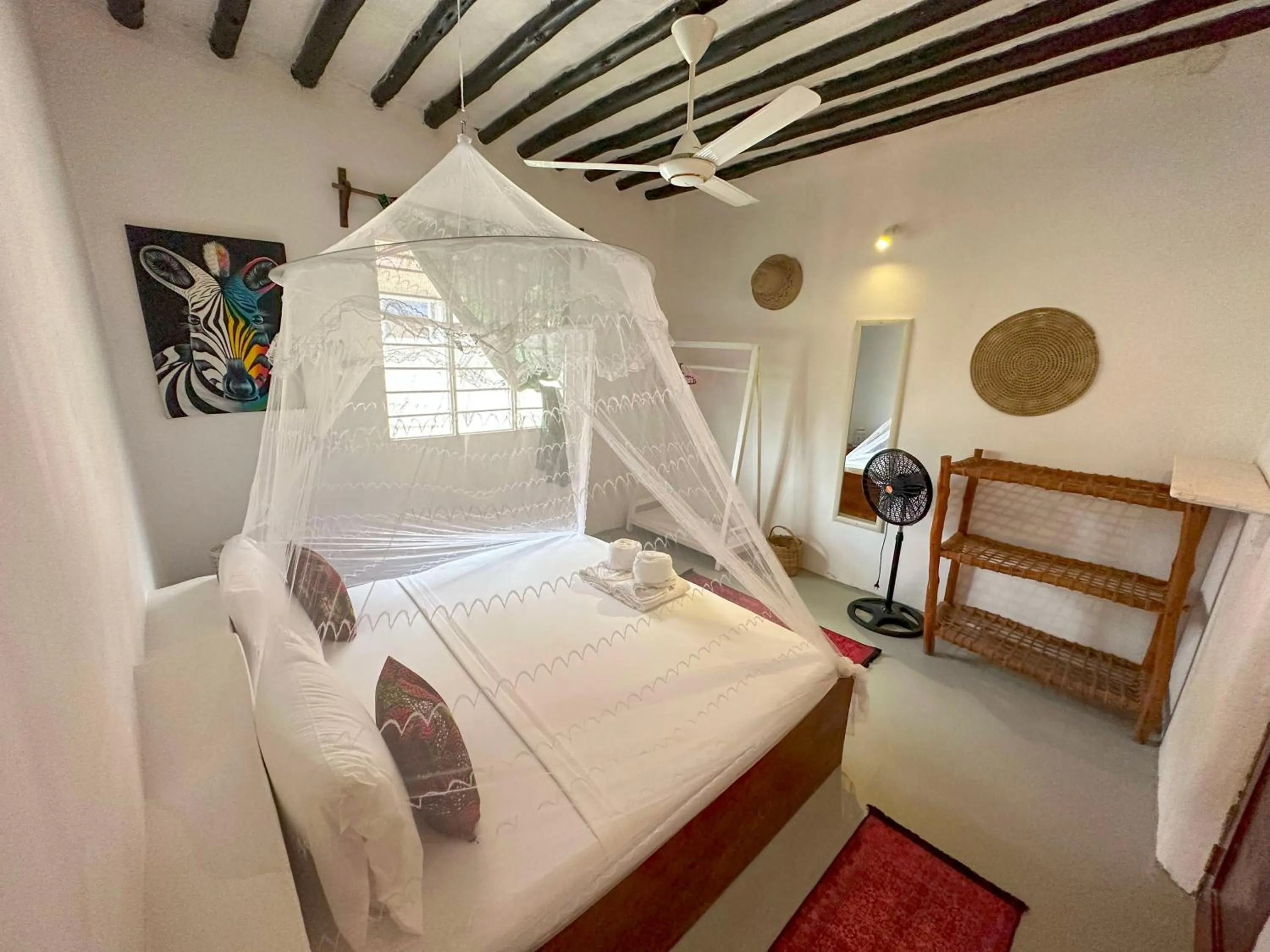 Bed in The African Paradise Beach Hotel