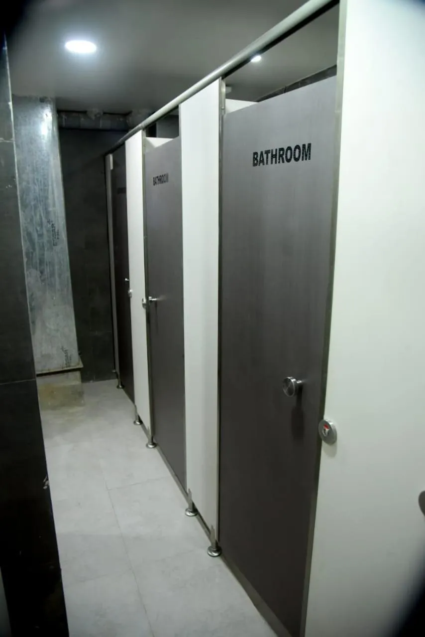 Bathroom in CHARYANA HOTEL AC DORMITORY