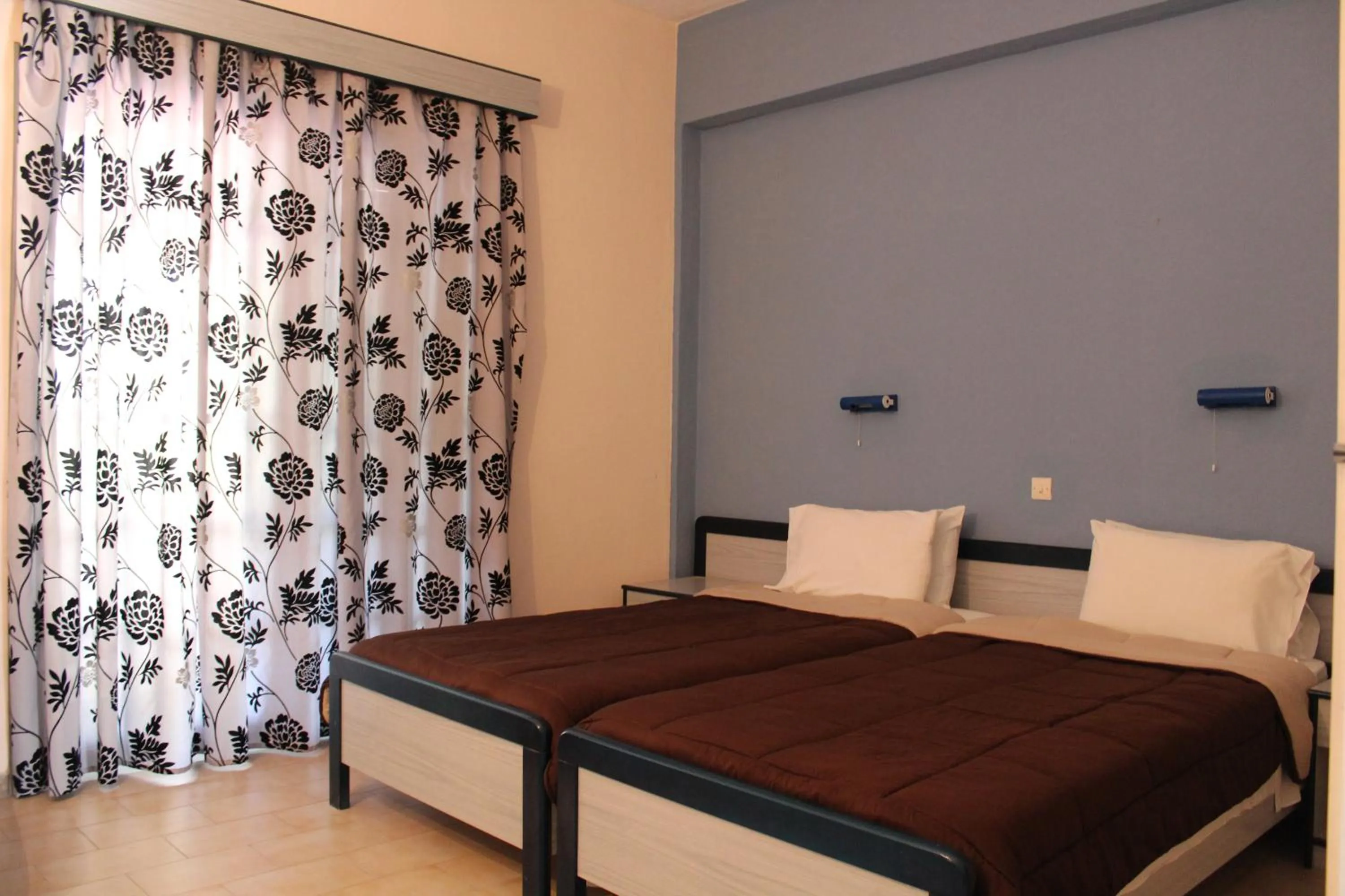 Bed in Glyfada Gorgona Apartments