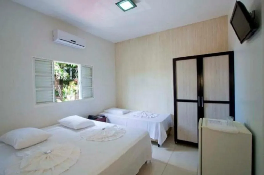 Photo of the whole room, Bed in Hotel Pousada Calliandra