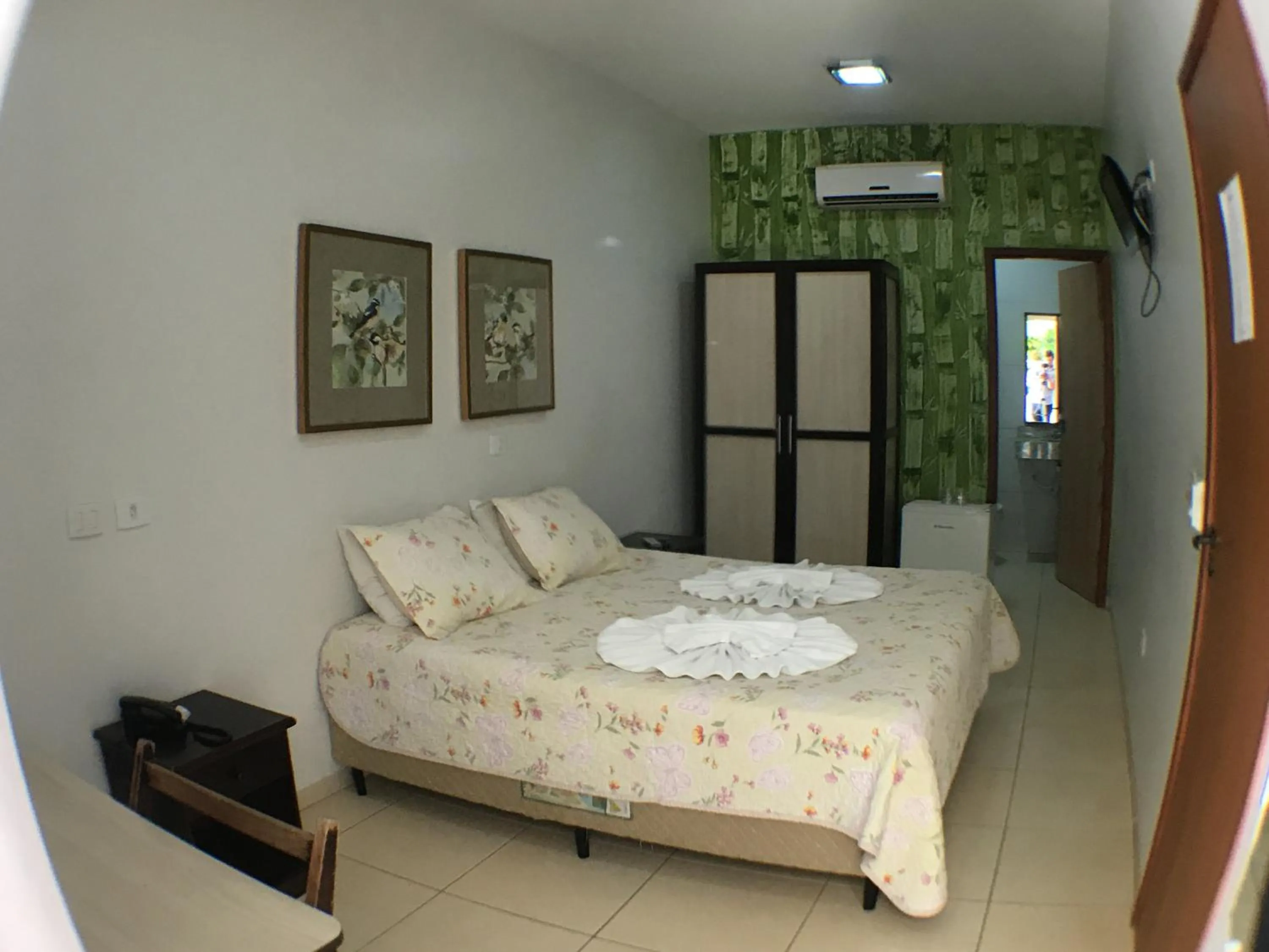 Bed in Hotel Pousada Calliandra